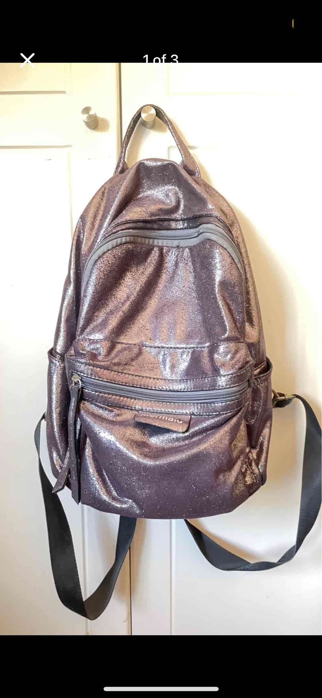 Mochila metálica brillante