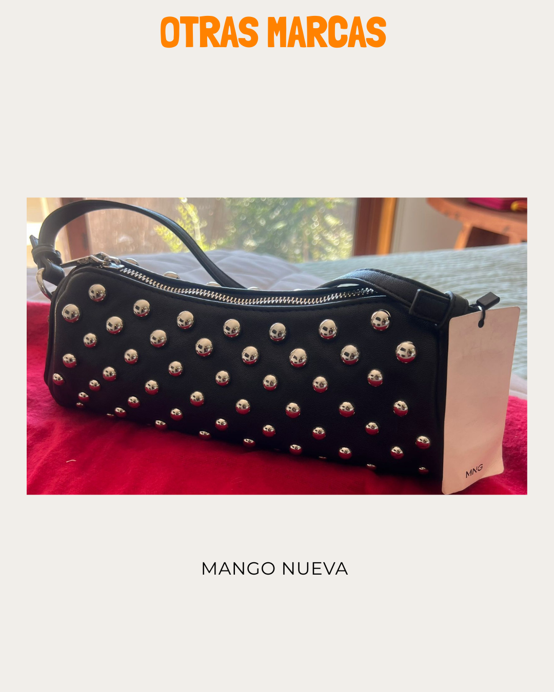 Cartera negra con tachas Mango