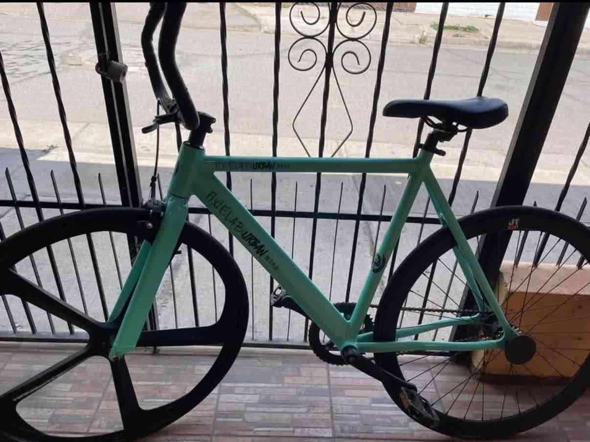 Bicicleta de carretera turquesa - miniatura 3
