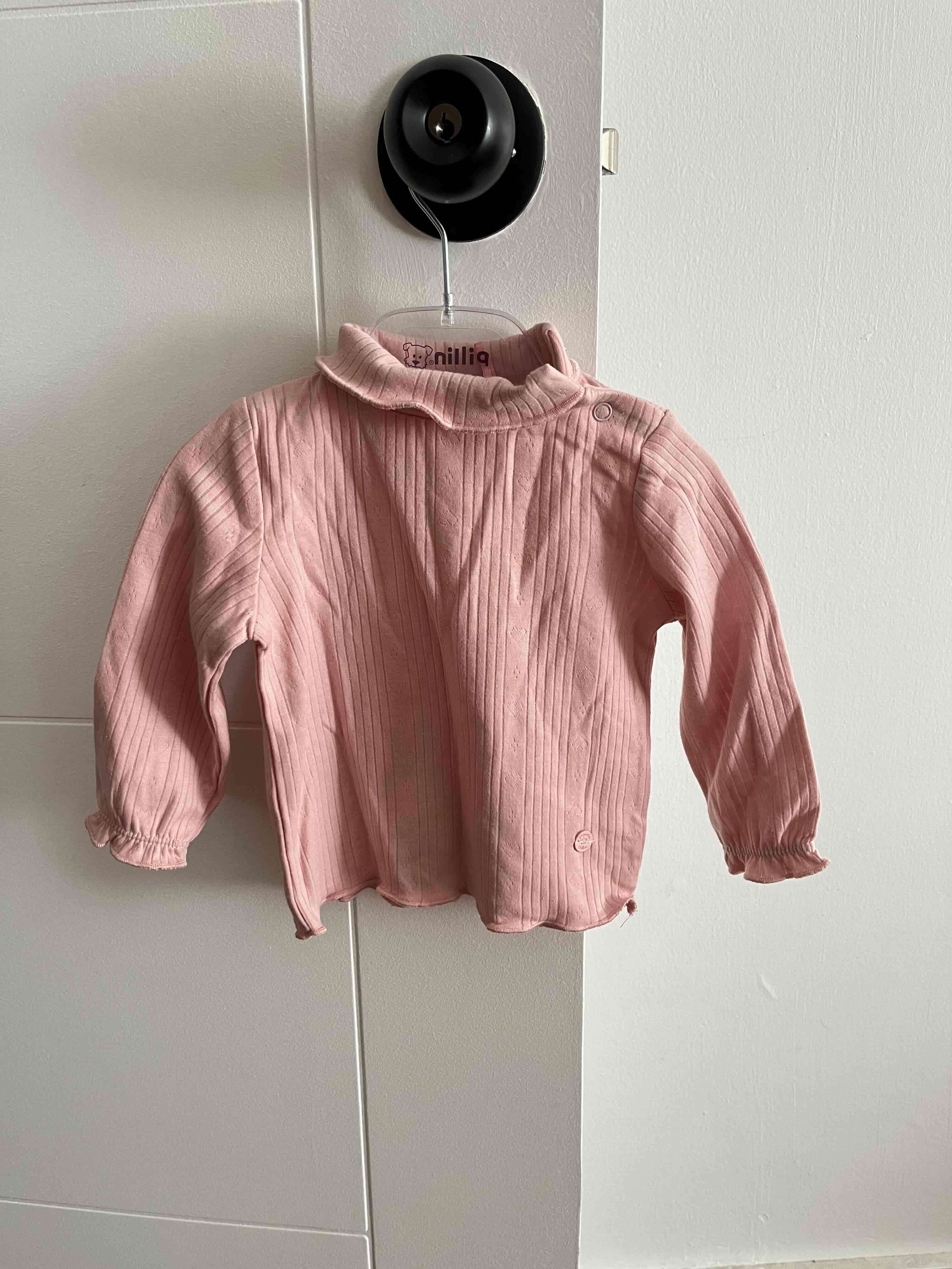 Polera rosada y blanca  para niña