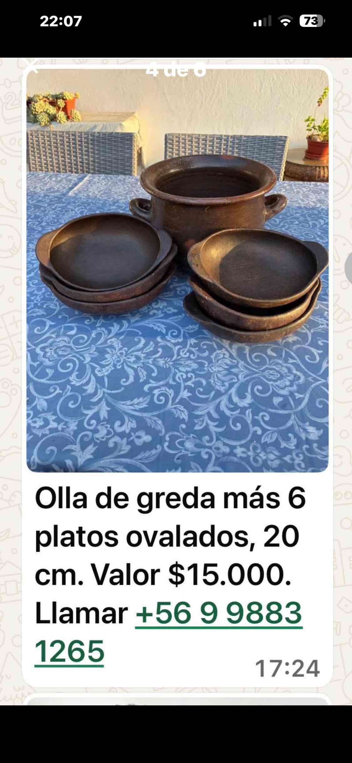 Olla de greda y platos ovalados