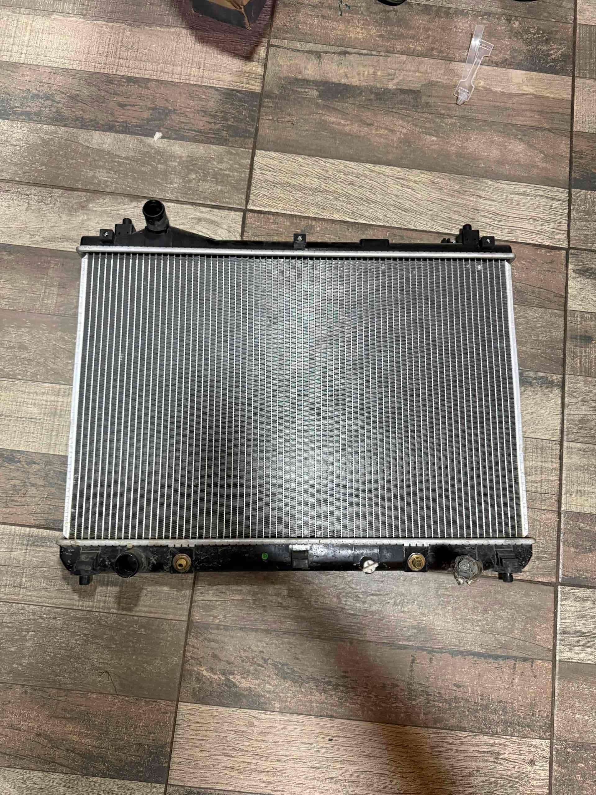 Radiador   Grand Nomade 2.4 /3era generación