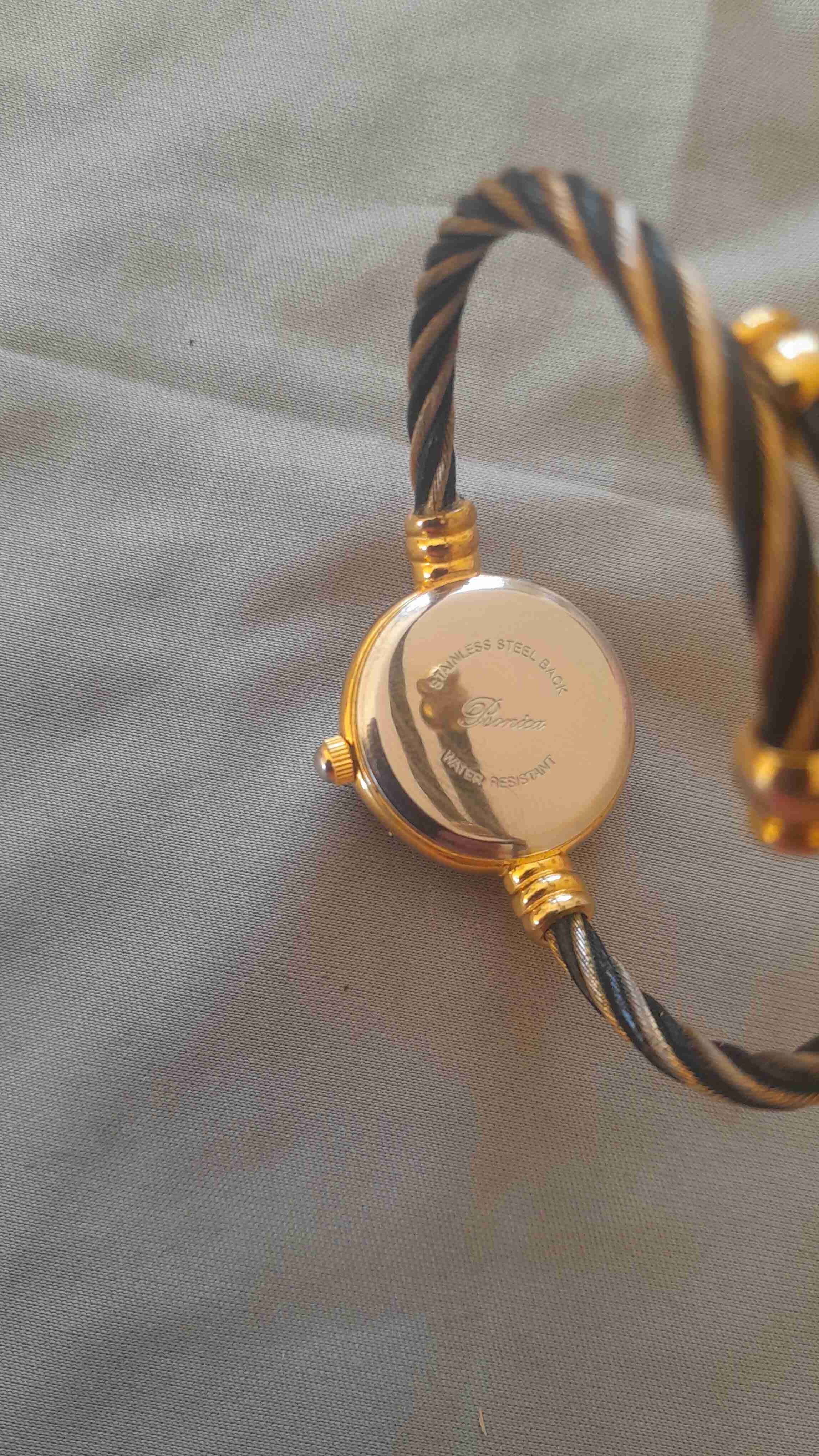 Reloj pulsera dorado y negro estilo vintage - miniatura 3