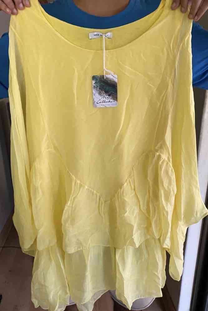 Blusa italiana amarilla con volantes