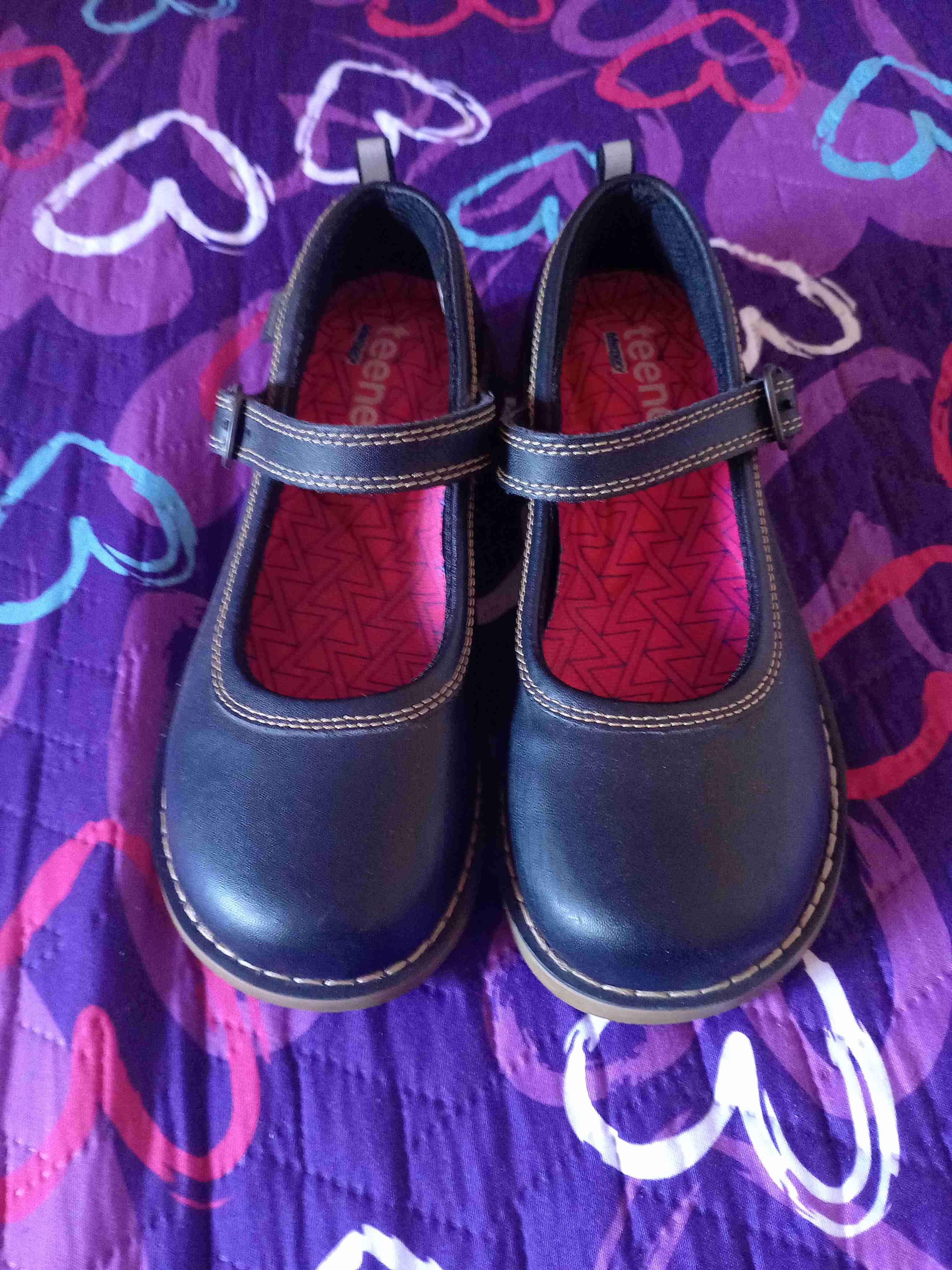 Zapatos negros con hebilla