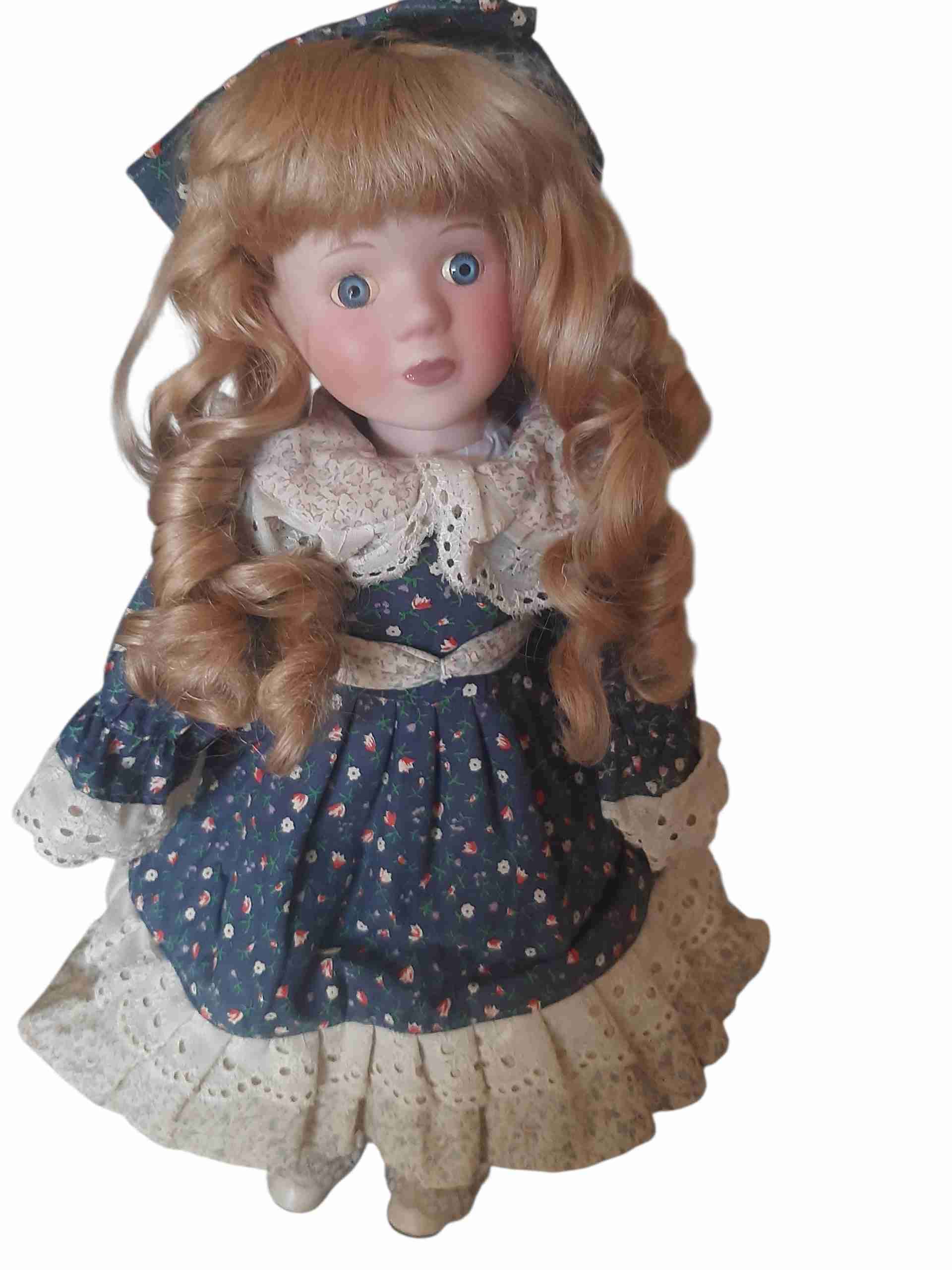 Muñeca de porcelana vintage - miniatura 2