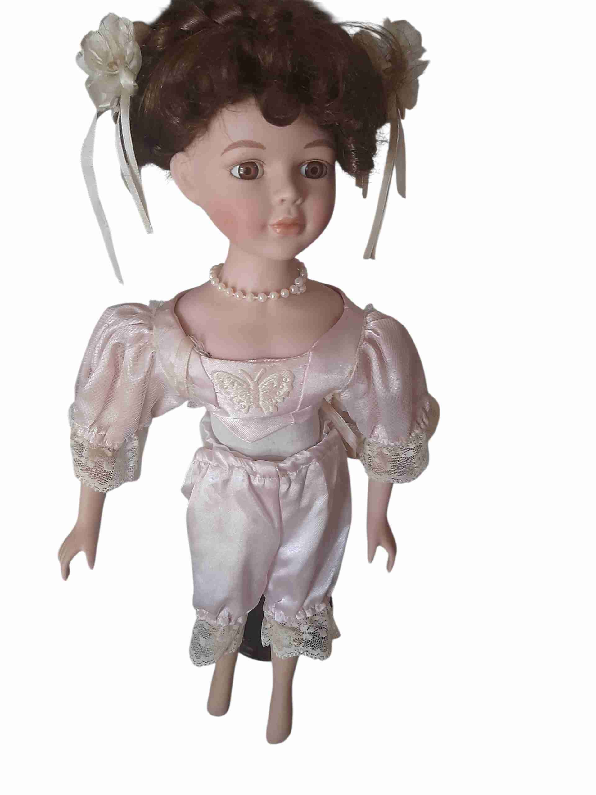 Muñeca de porcelana vintage - miniatura 2