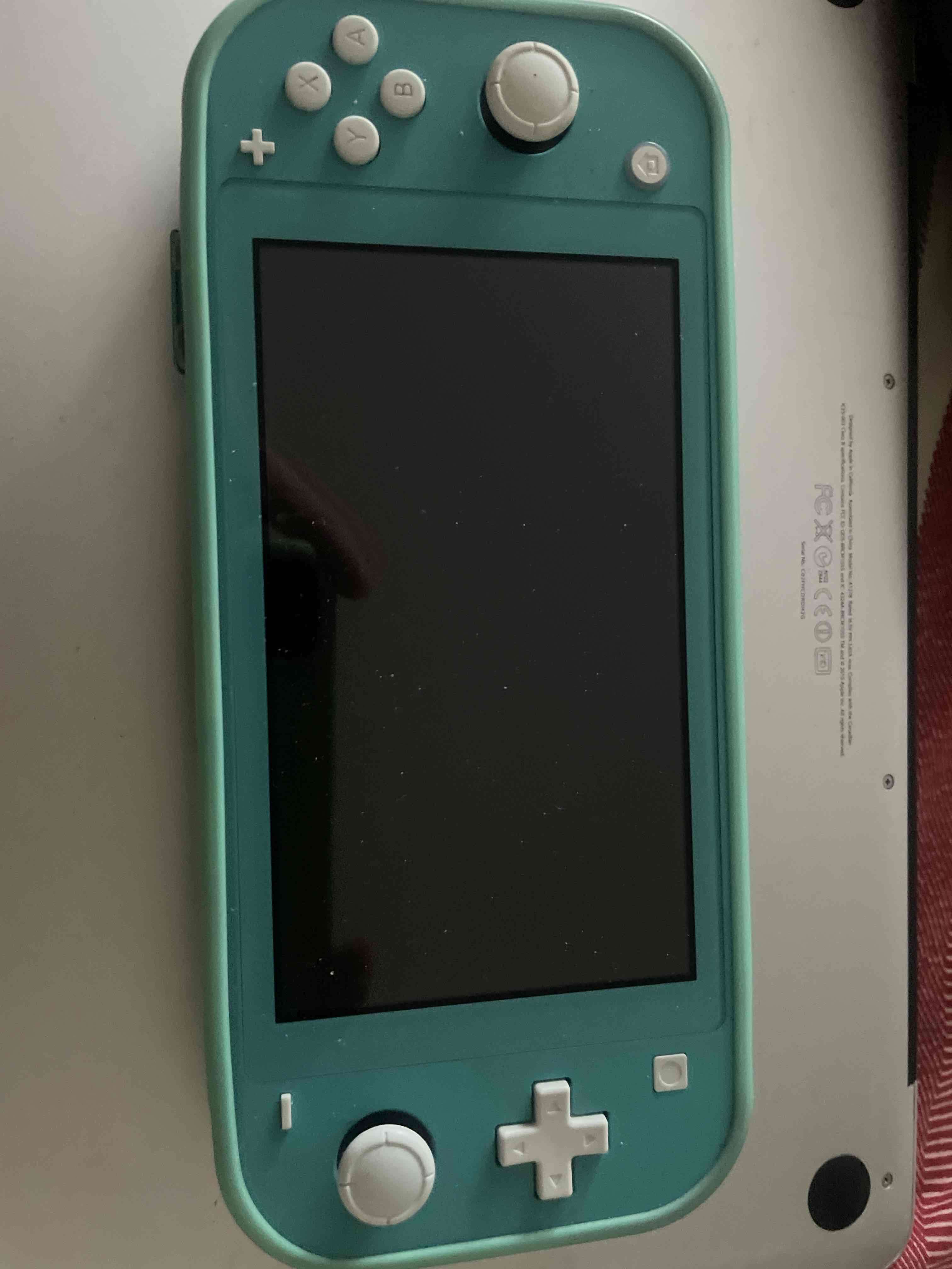 Nintendo switch lite turquesa en perfecto estado - miniatura 3