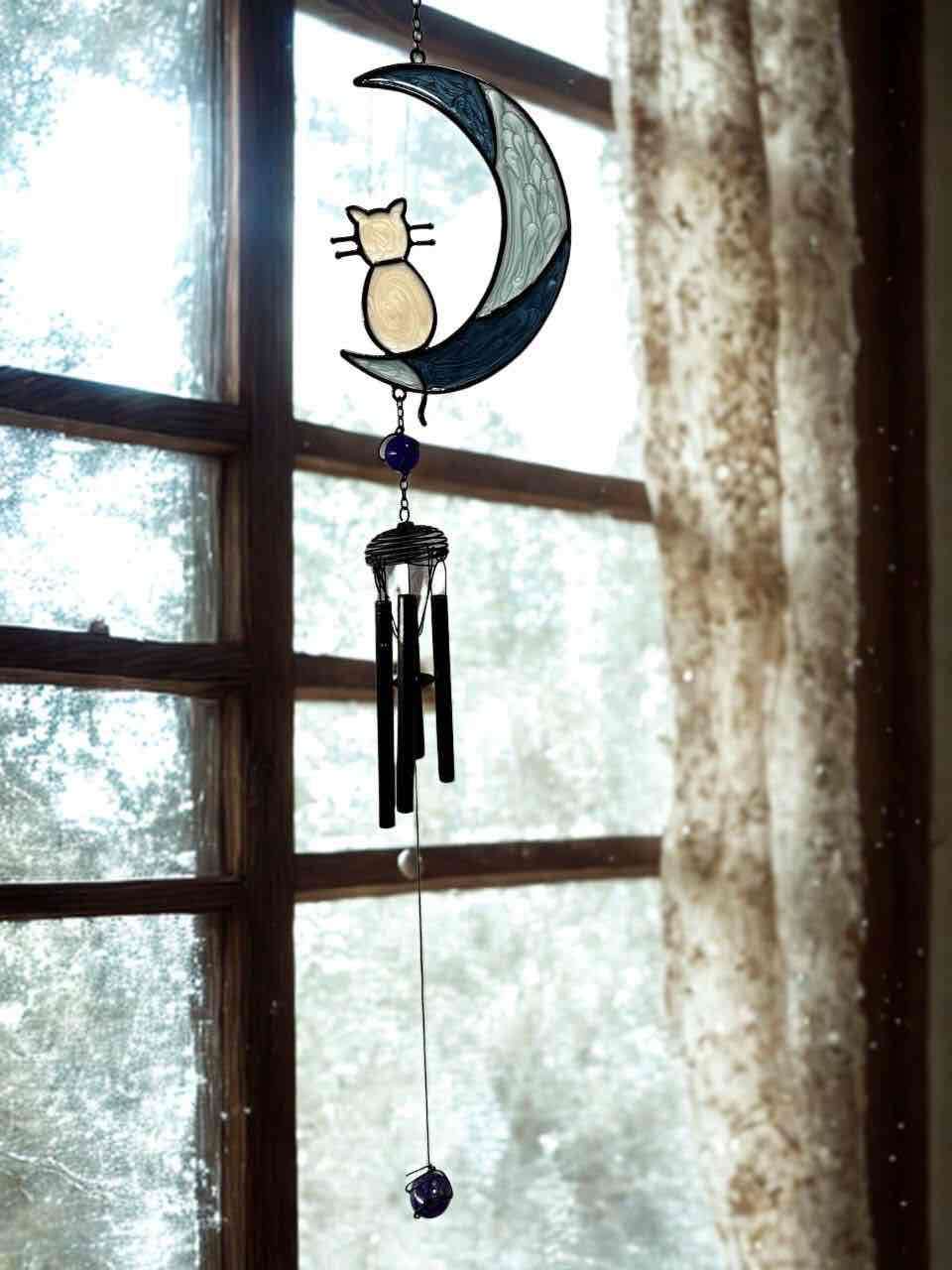 Campanilla de viento gato y luna