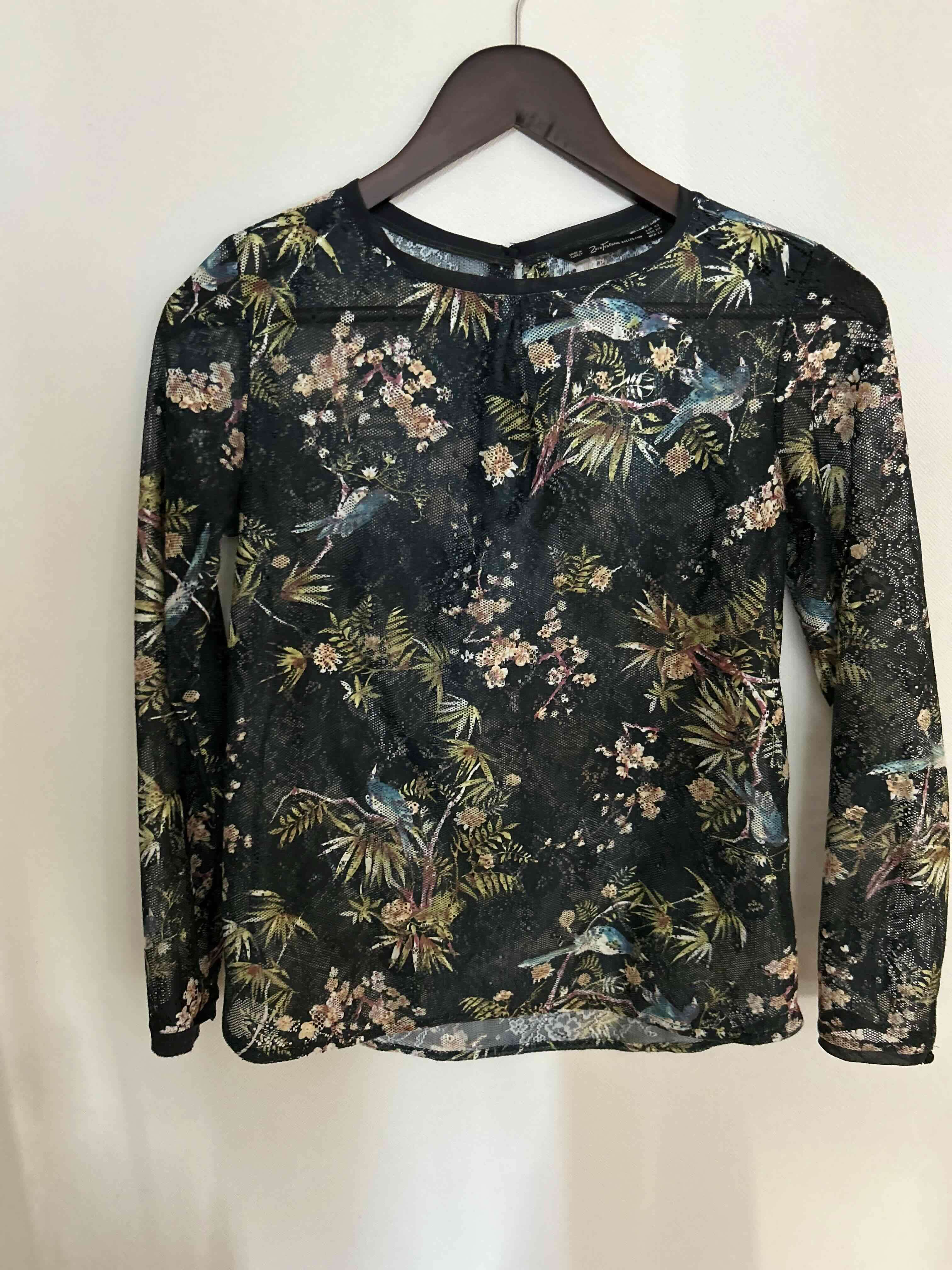 Blusa transparente estampada