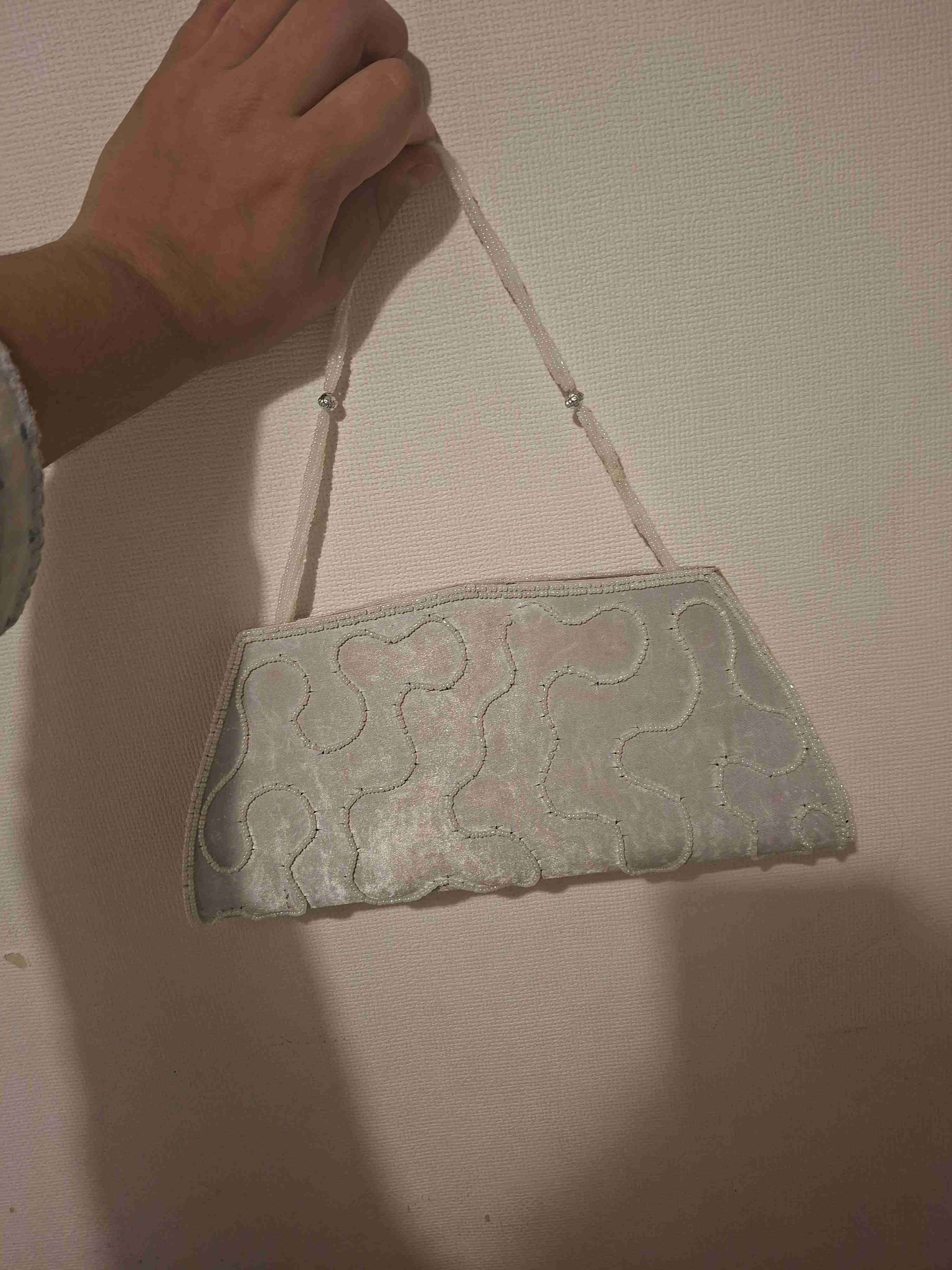 Cartera de mano de pedrería