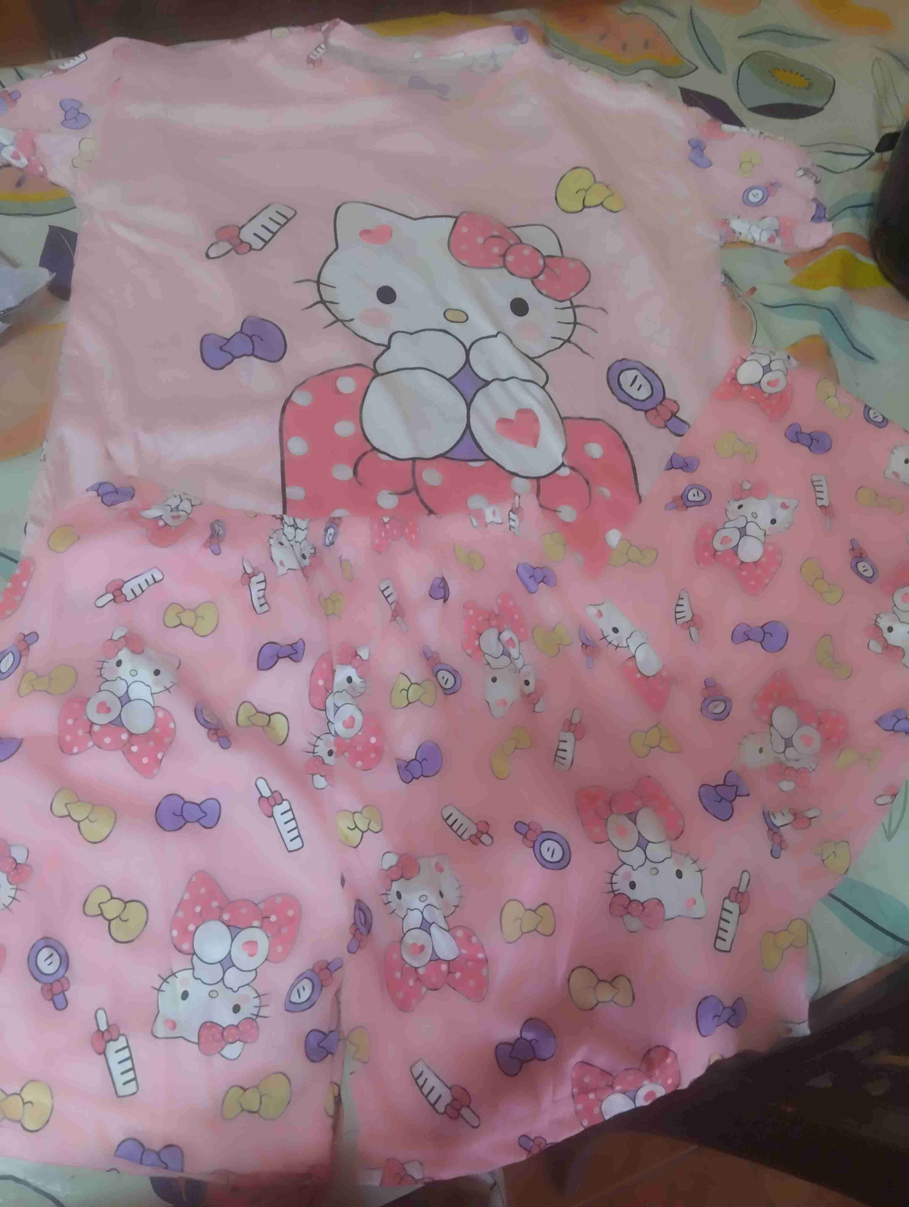Pijama rosado con diseño infantil