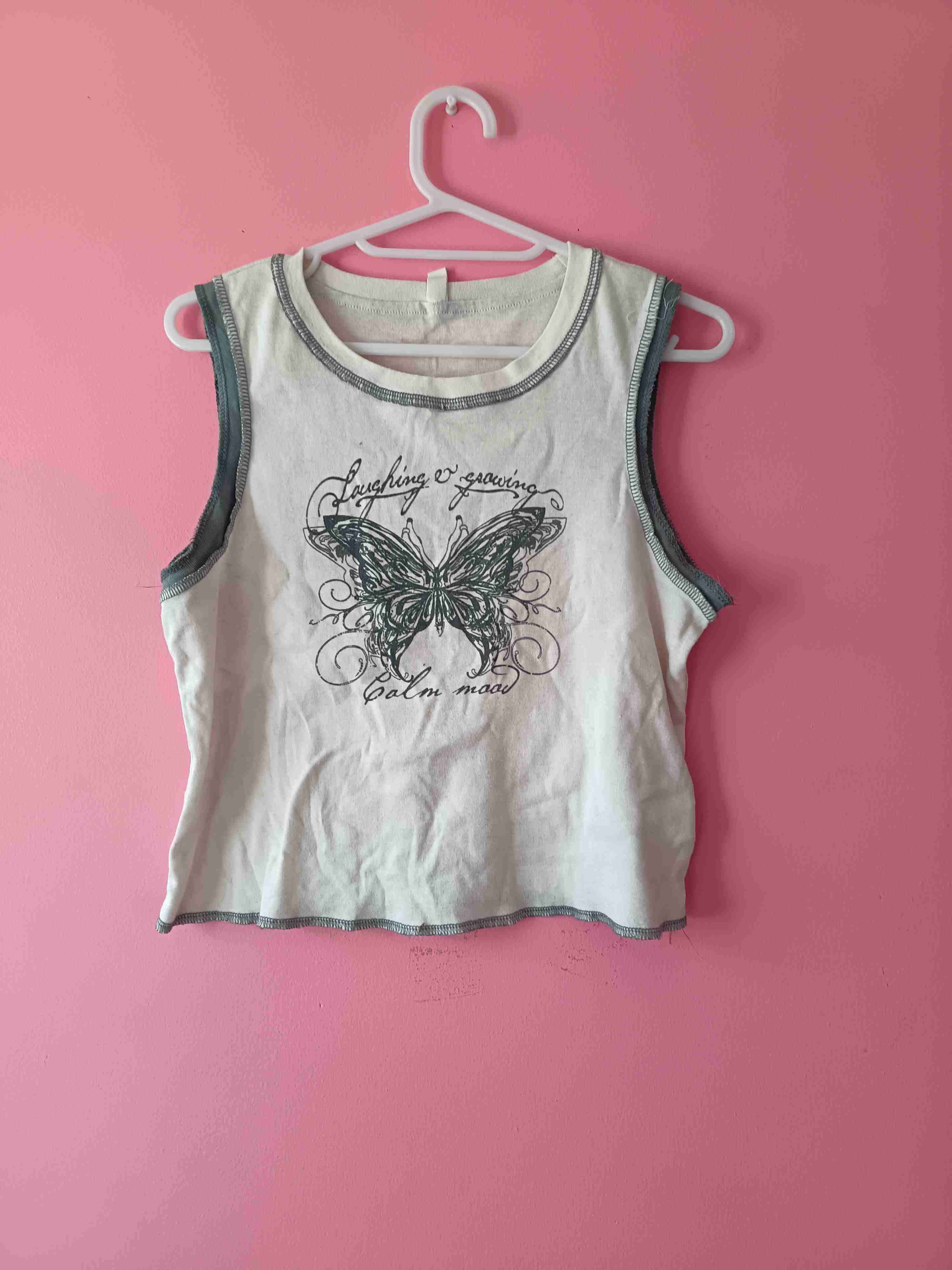 Polera sin mangas mariposa - miniatura 2