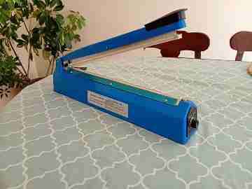 Sellador de bolsas azul