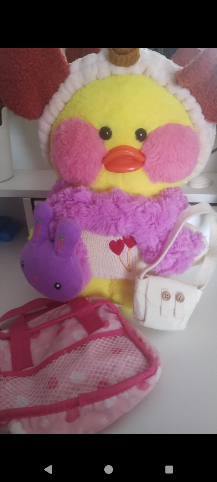 Peluche amarillo con accesorios