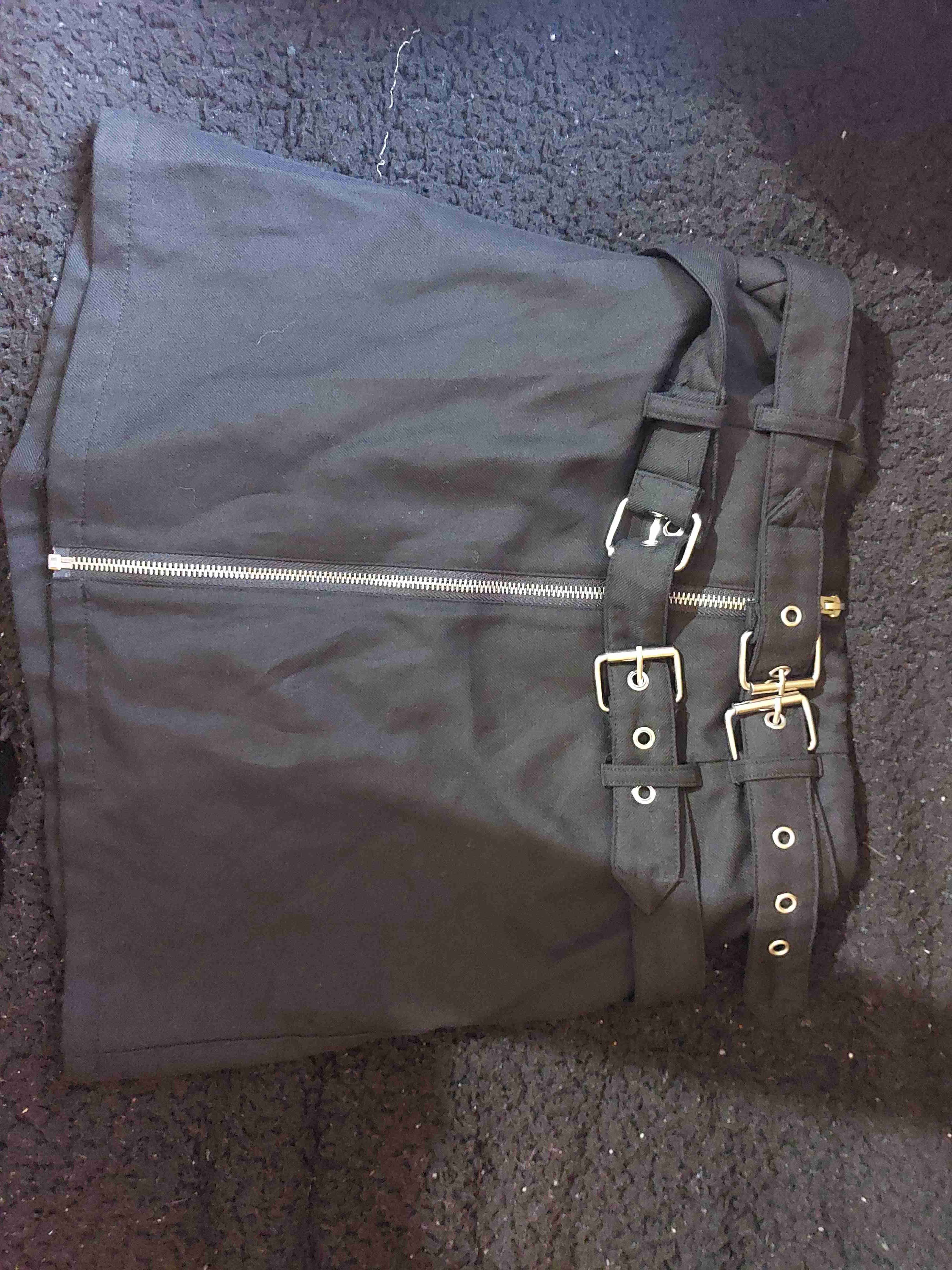 Mini falda talla s negra con cinturones