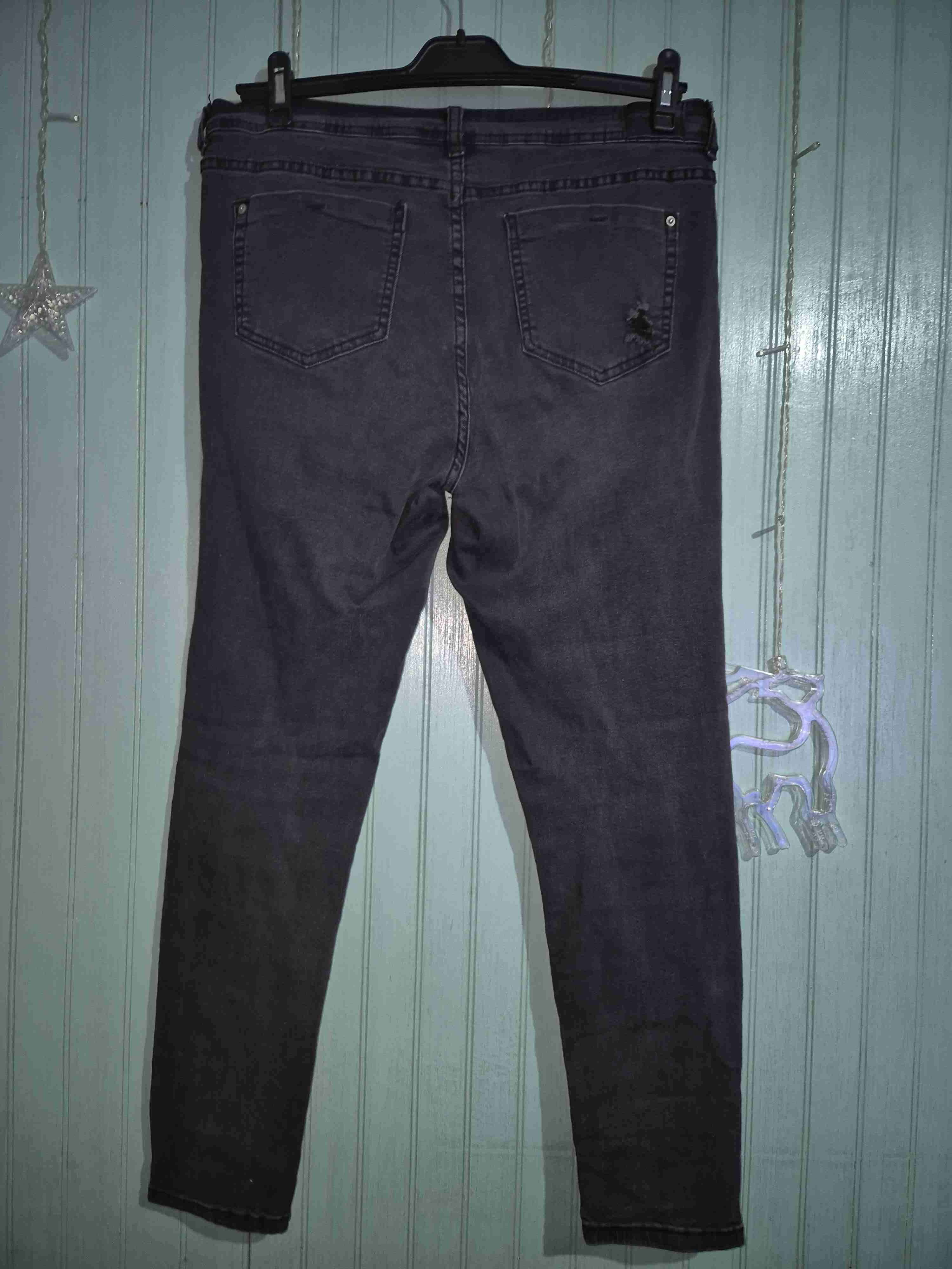 Jeans con roturas - miniatura 3