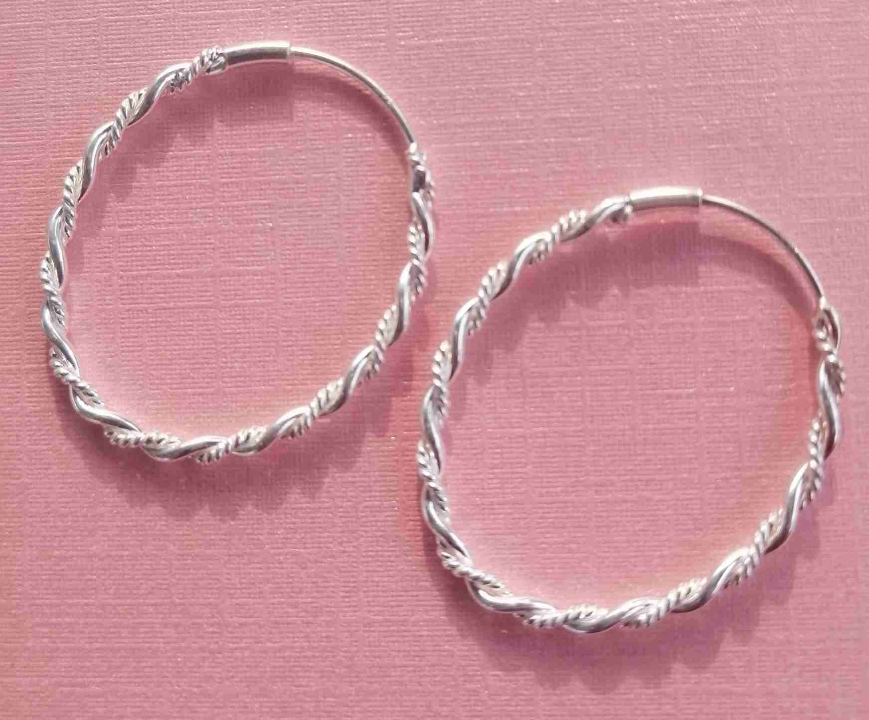 Aros de plata trenzados