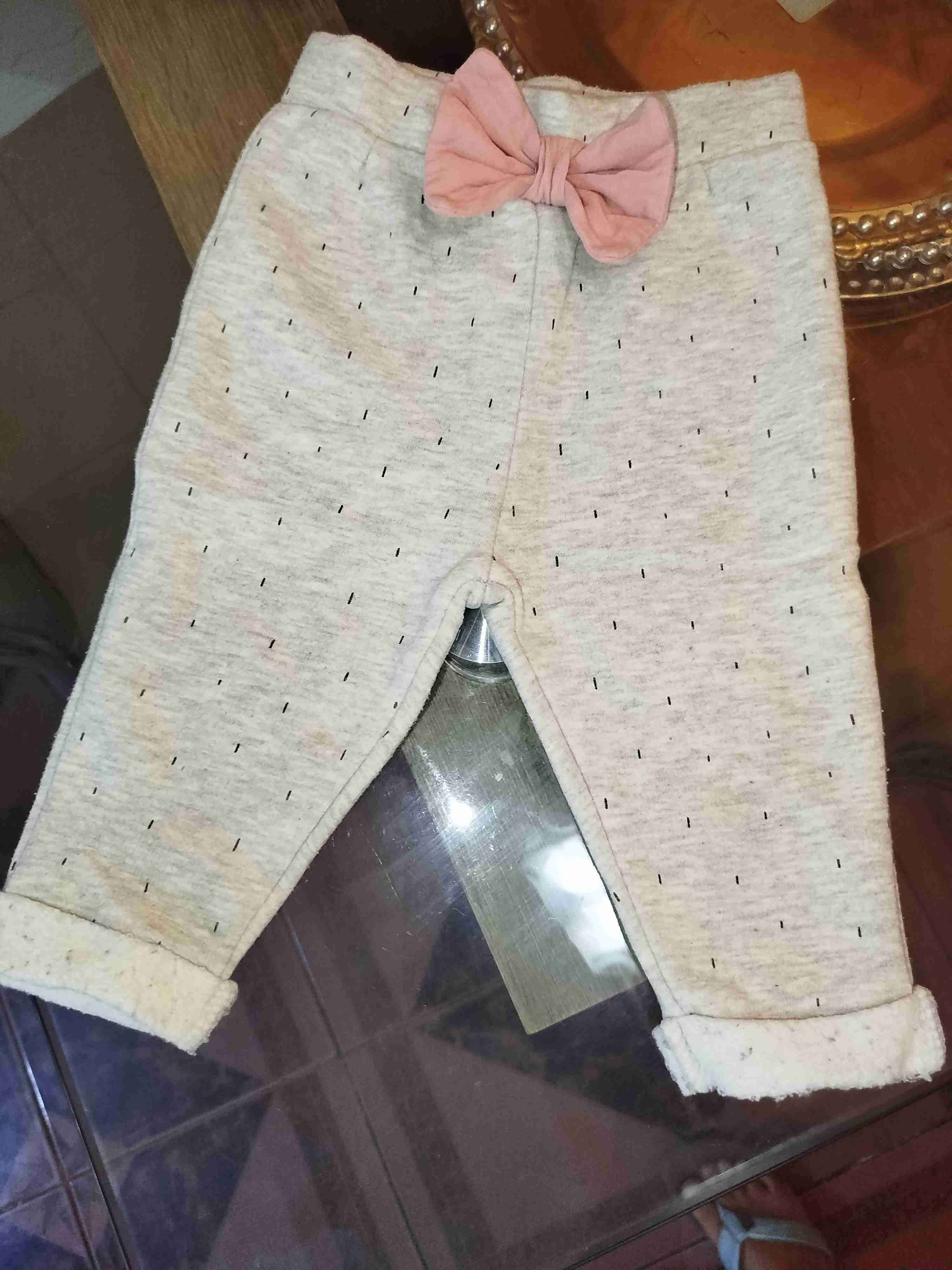 Buzo bebé con lazo rosa