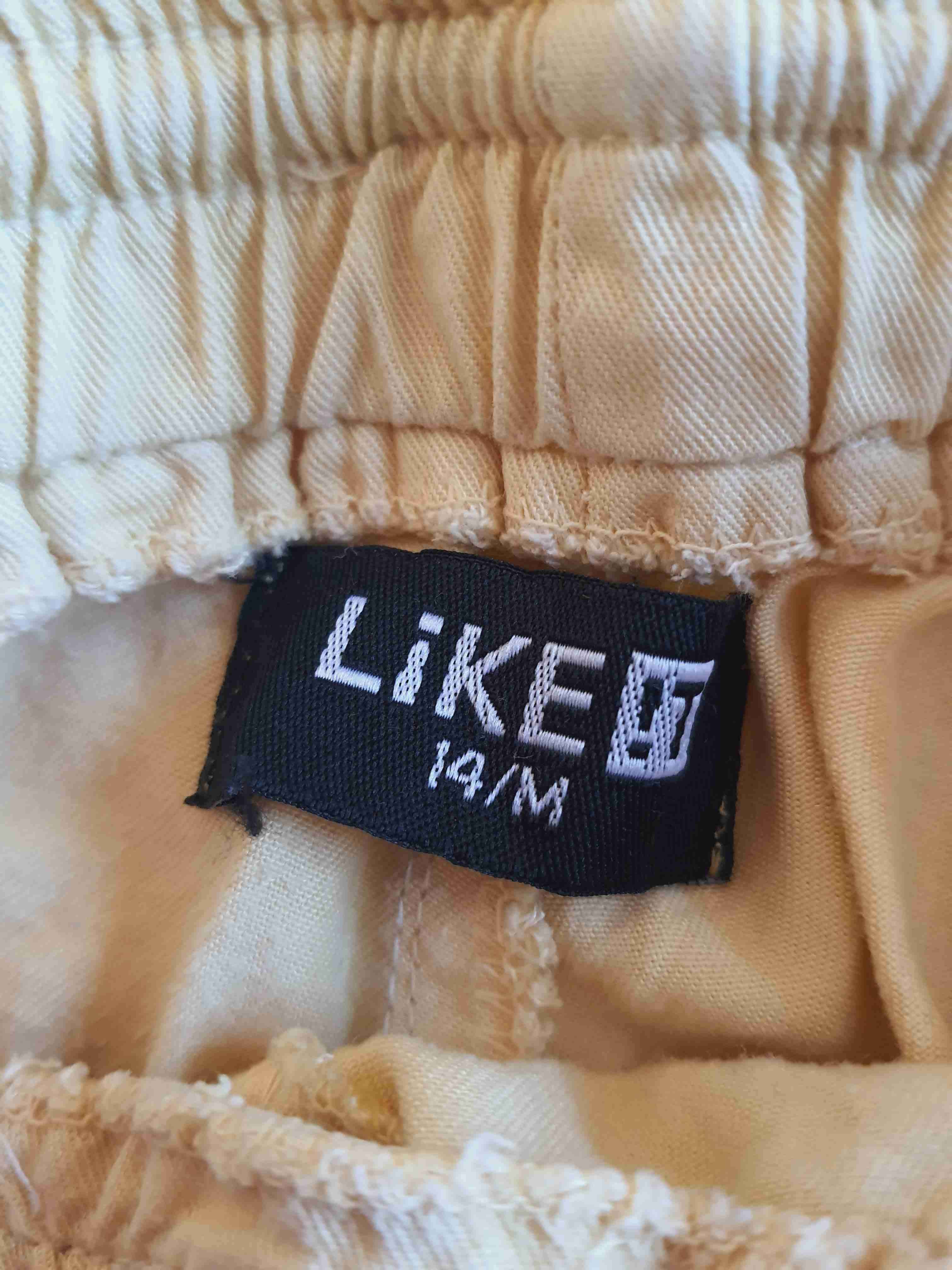 Shorts deportivos amarillos - miniatura 3