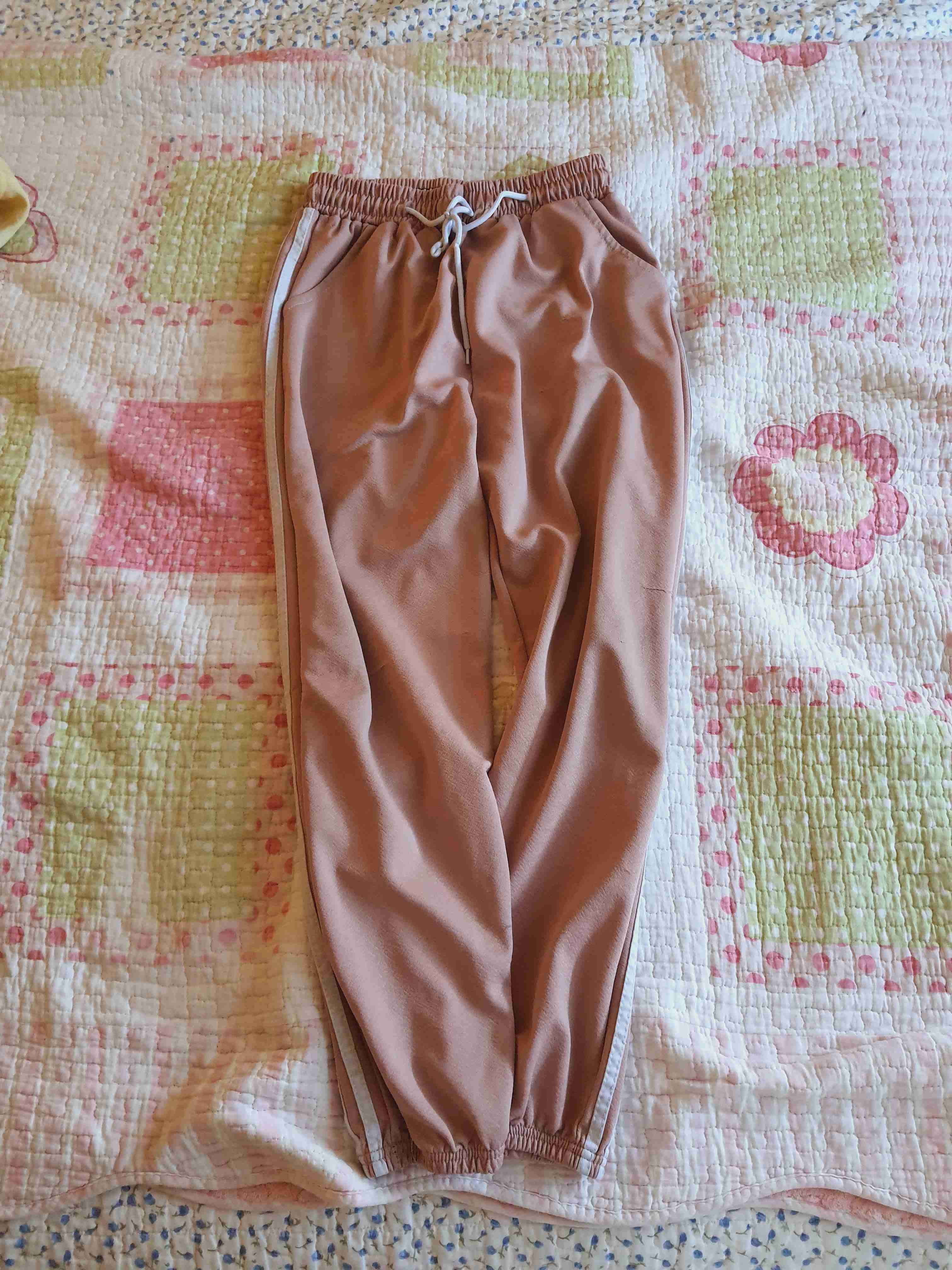 Pantalones deportivos rosa claro