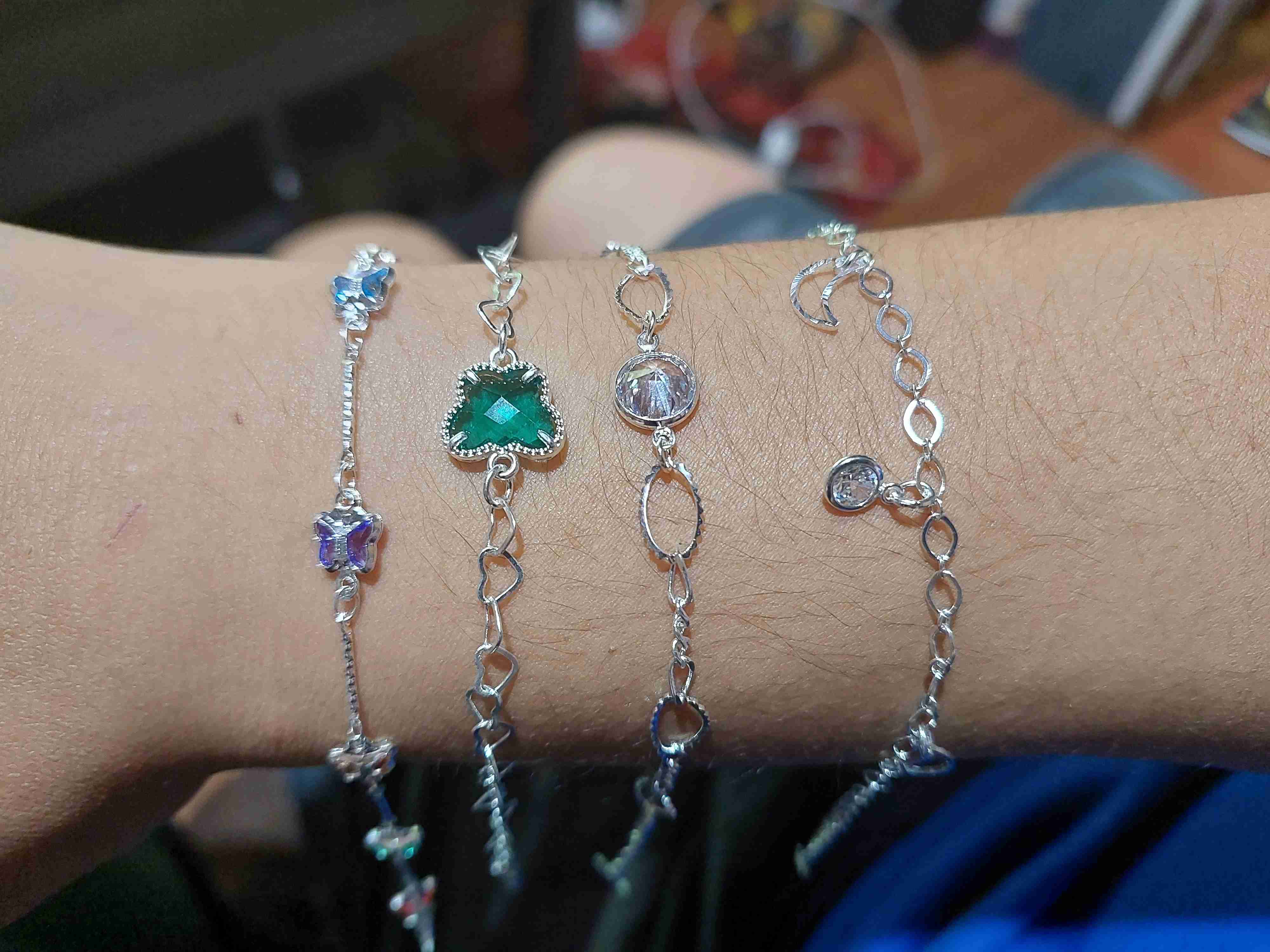 Pulseras de plata con dijes