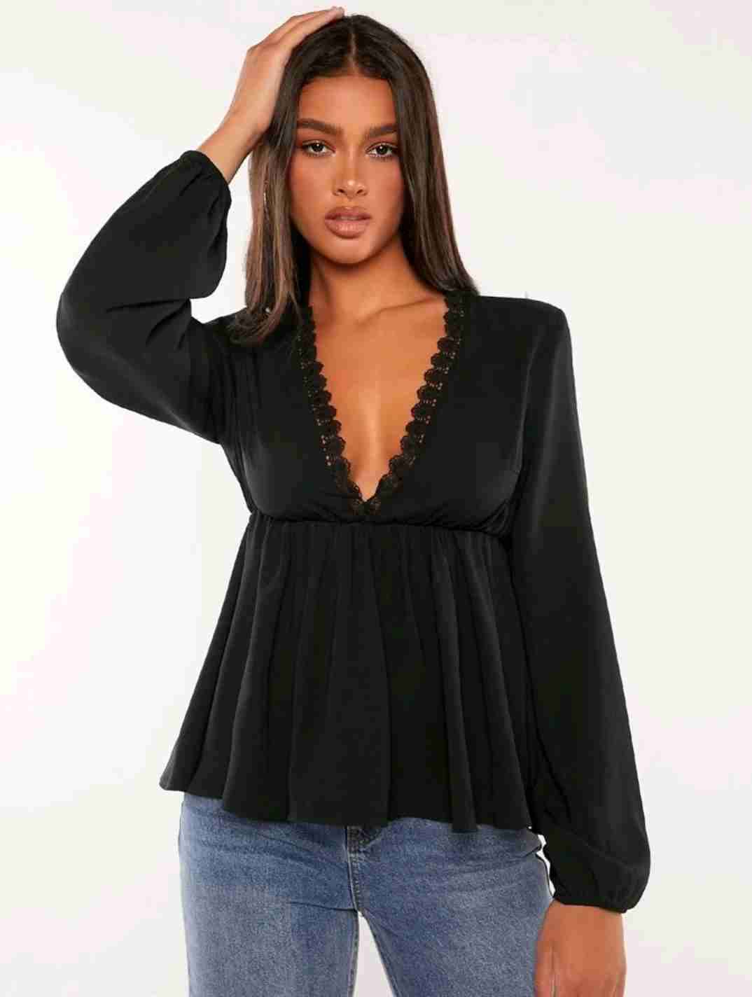 Blusa negra de encaje