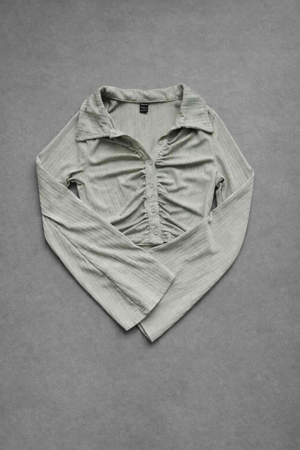 Blusa verde de manga larga