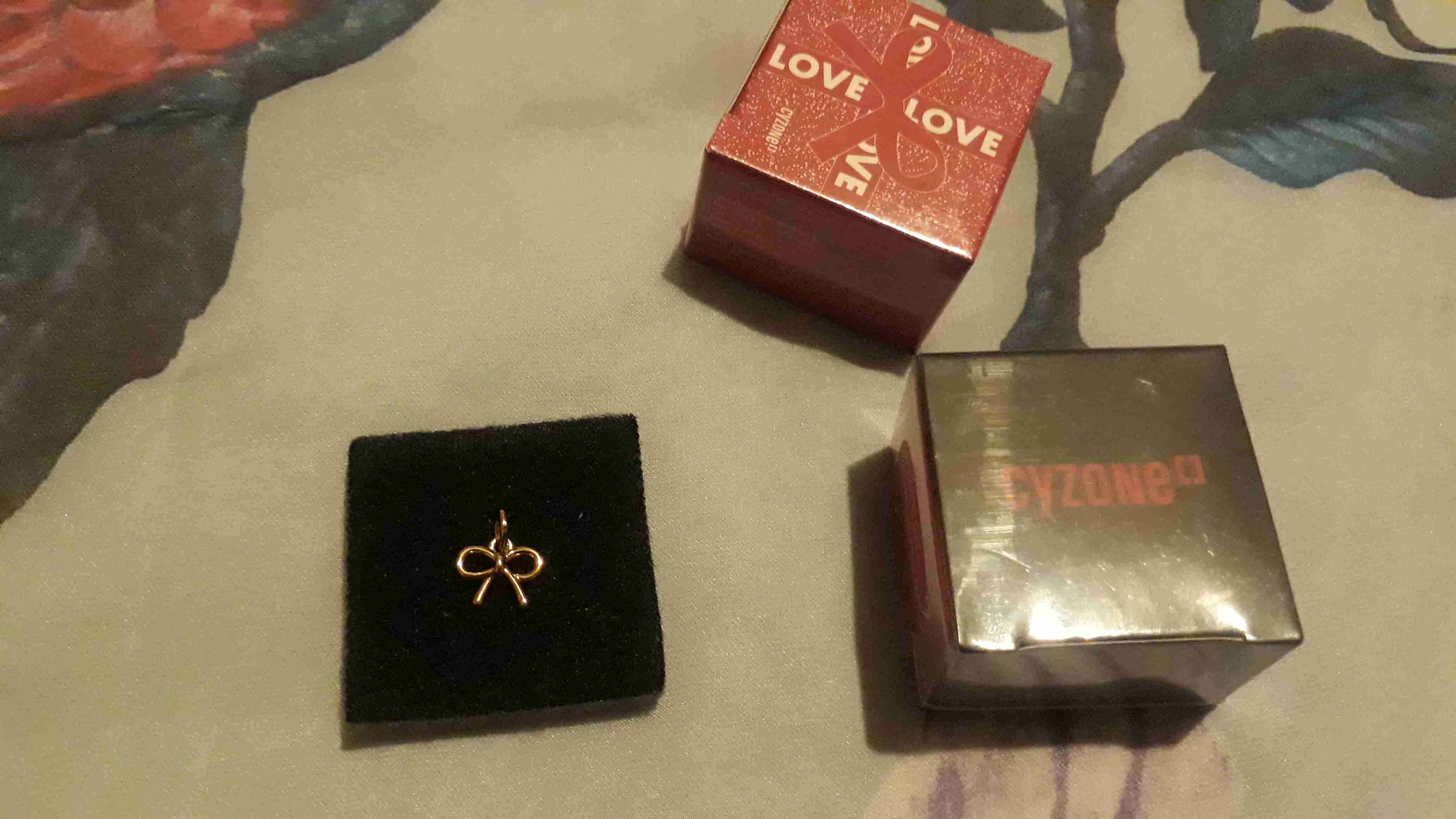 Charm dorado Coquette - miniatura 2