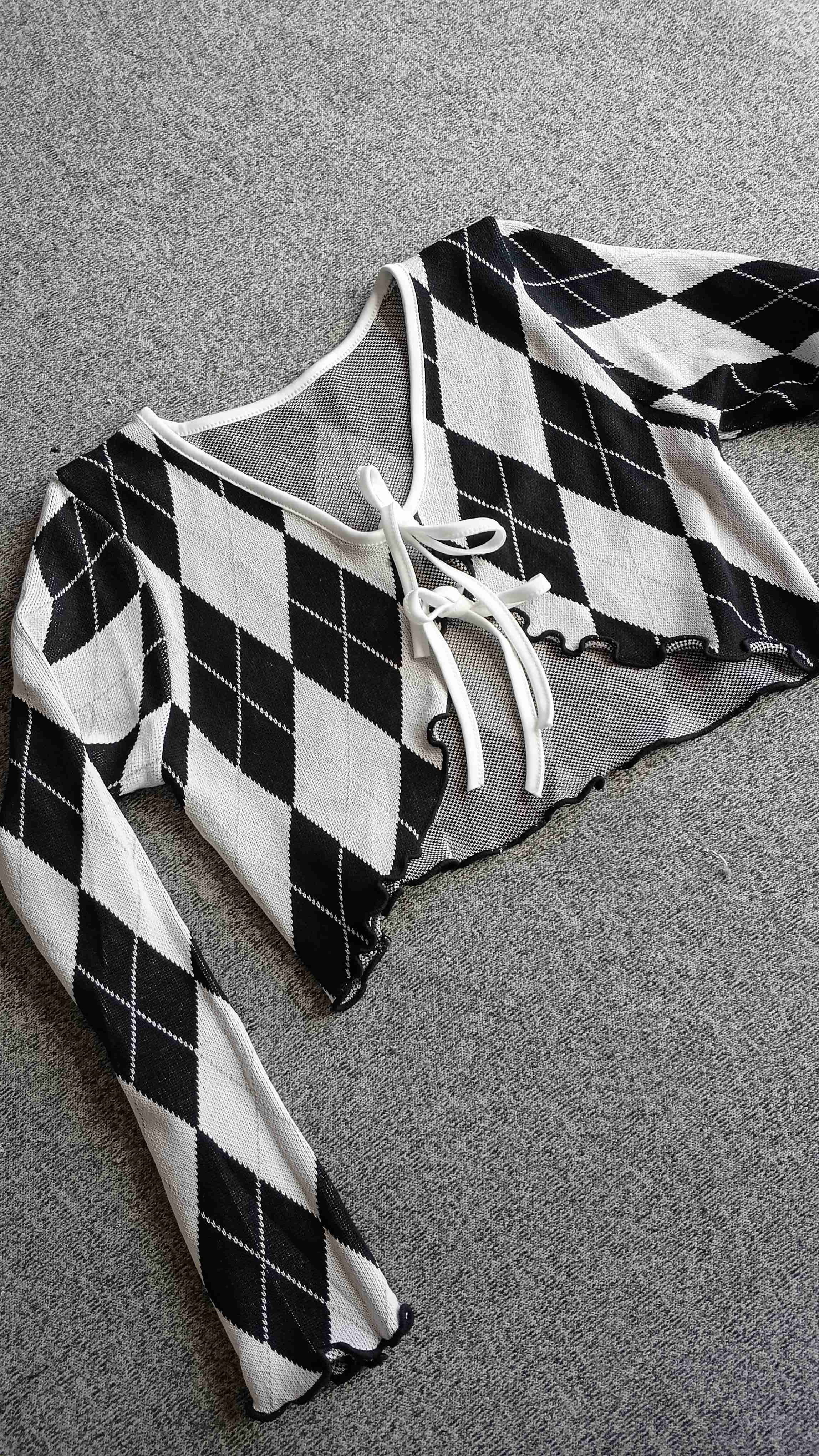 Cardigan blanco y negro de rombos