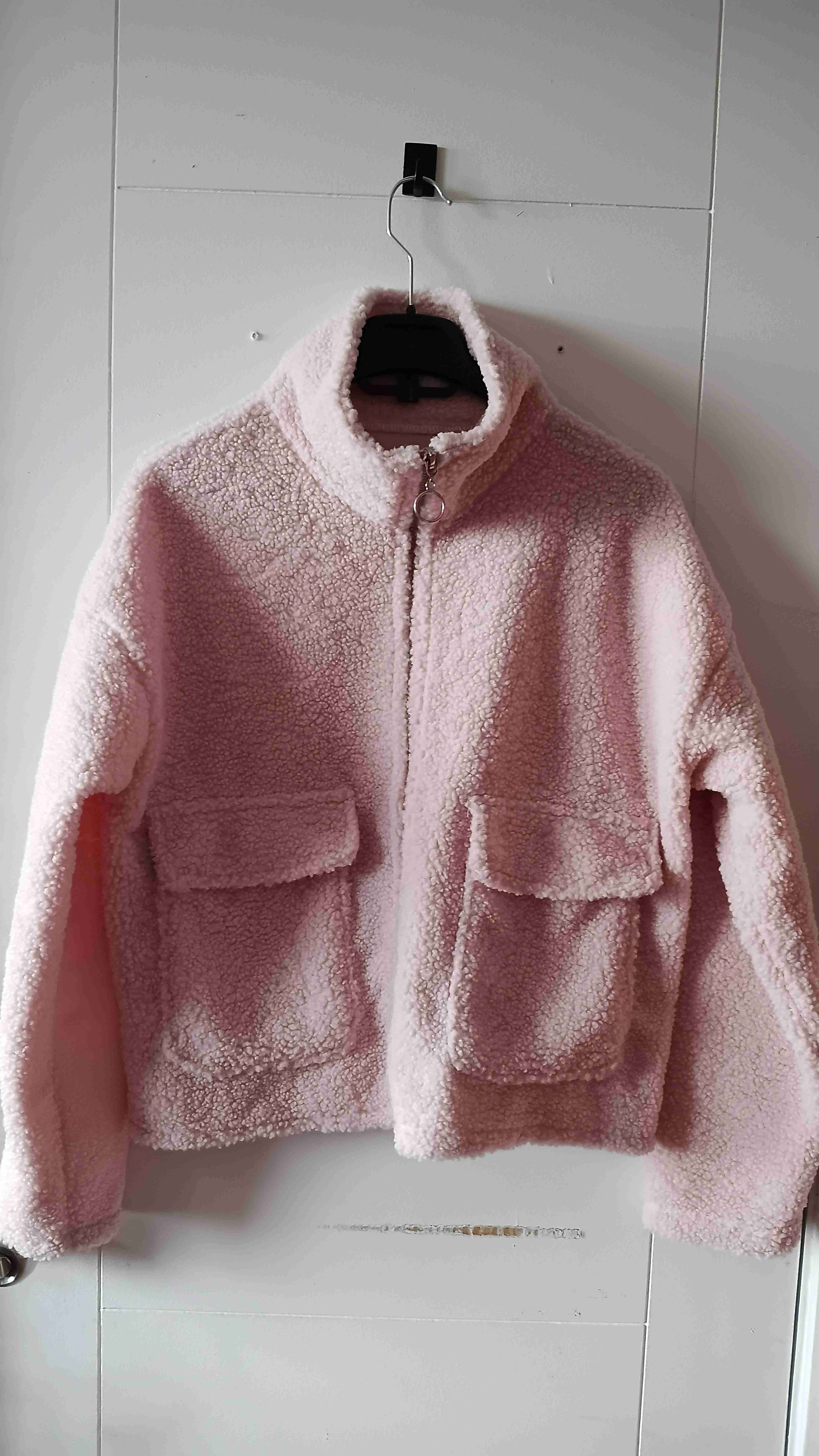 Chaqueta polar rosada de mujer