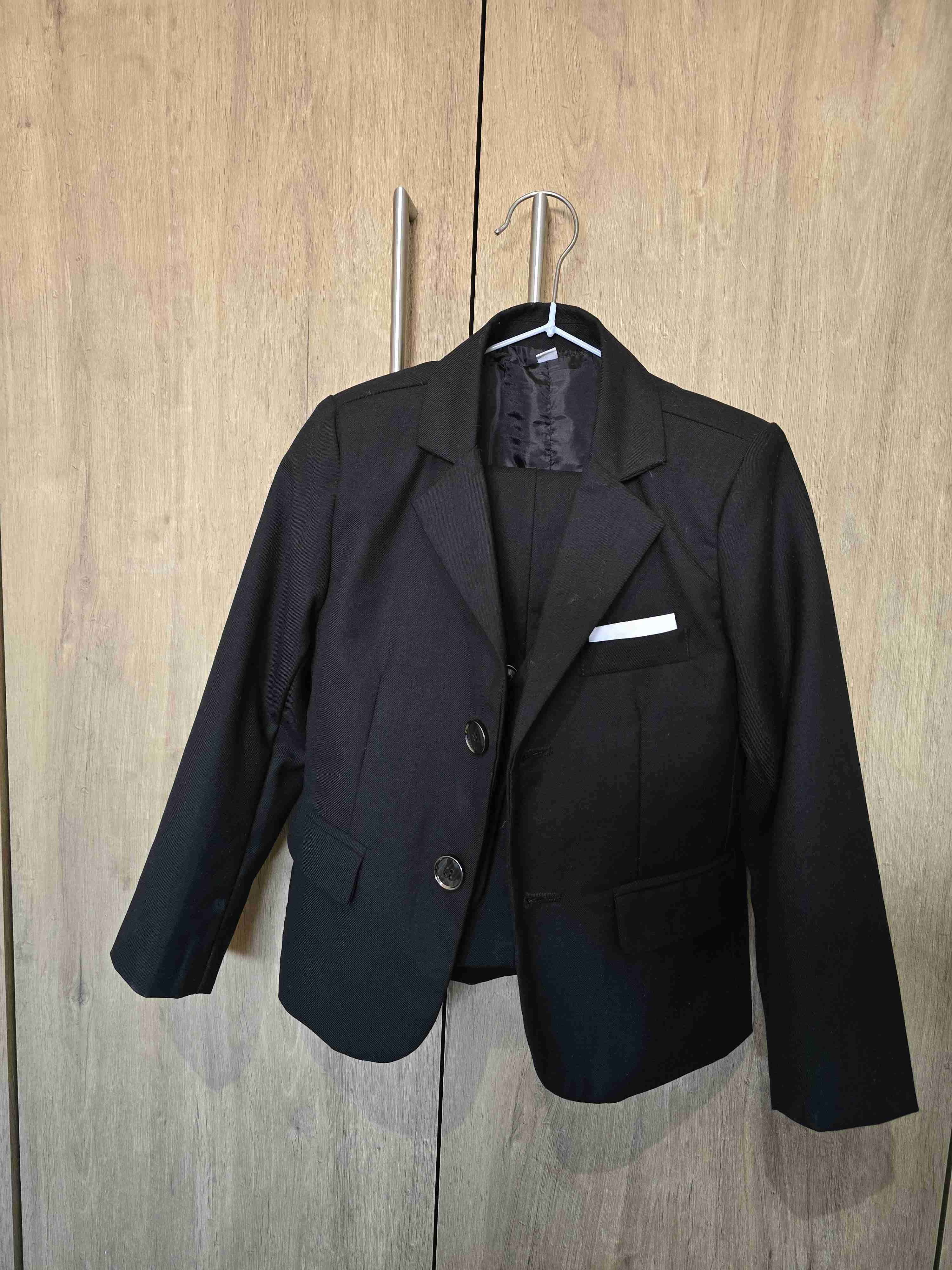 Blazer negro  y azul de niño c/u