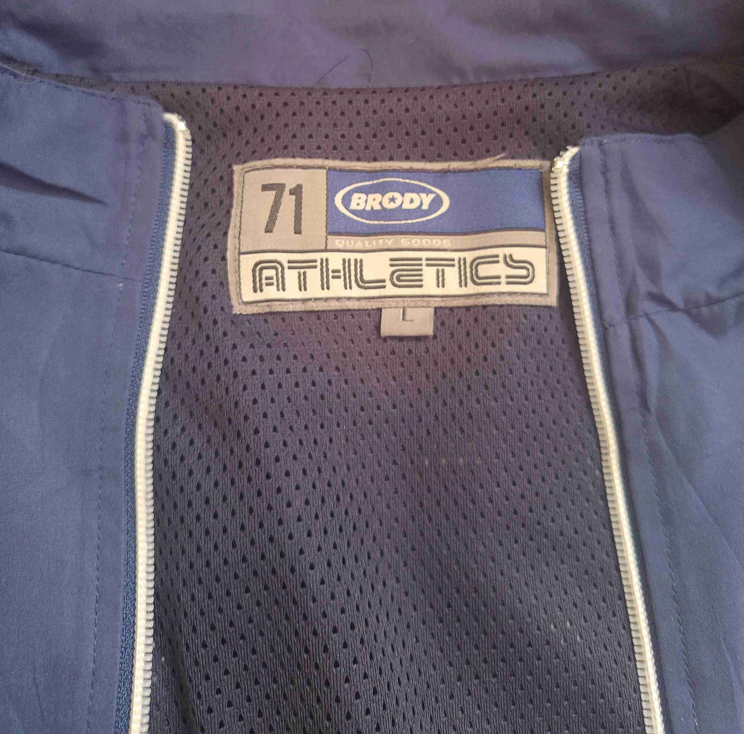 Chaqueta deportiva azul y blanca - miniatura 2