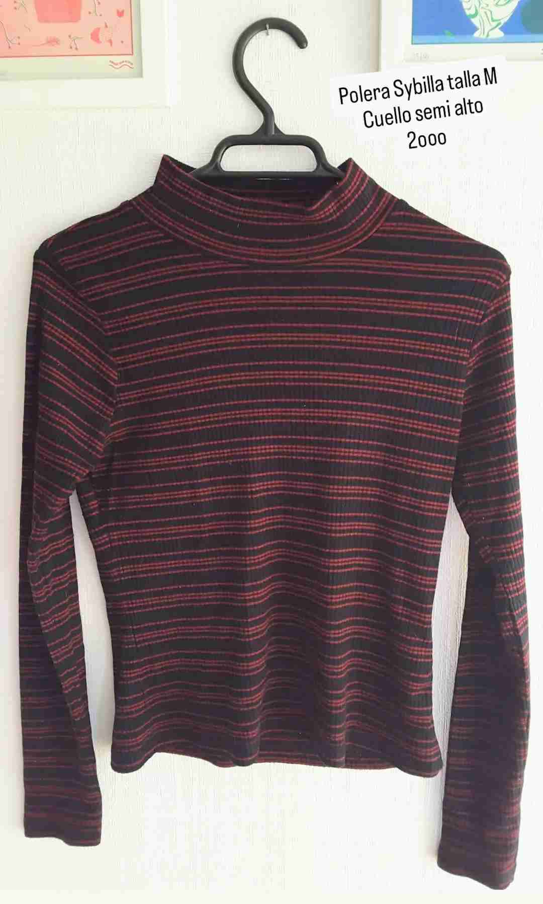 Polera Sybilla rayada cuello alto