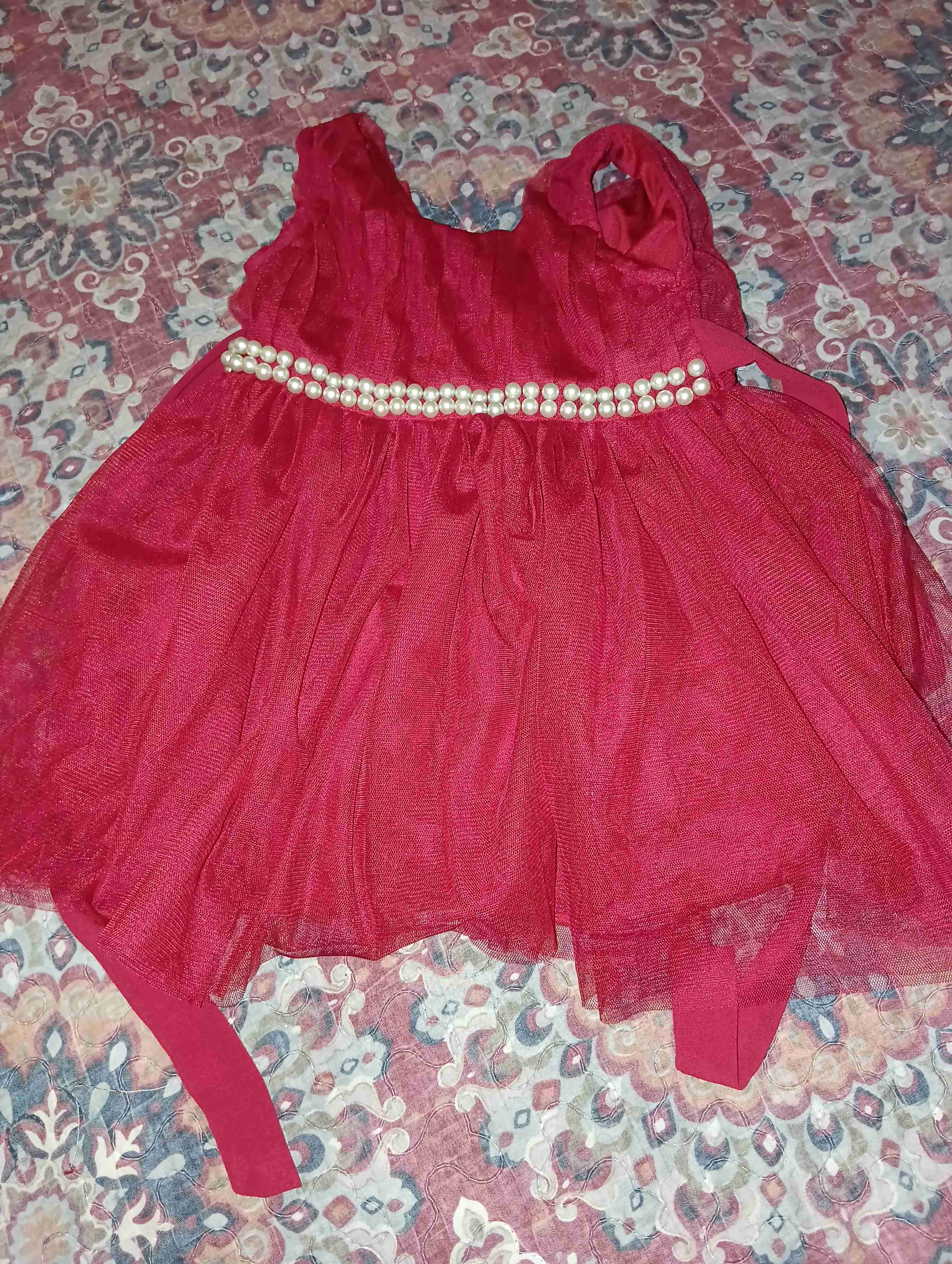 Vestido niña rojo con perlas HM