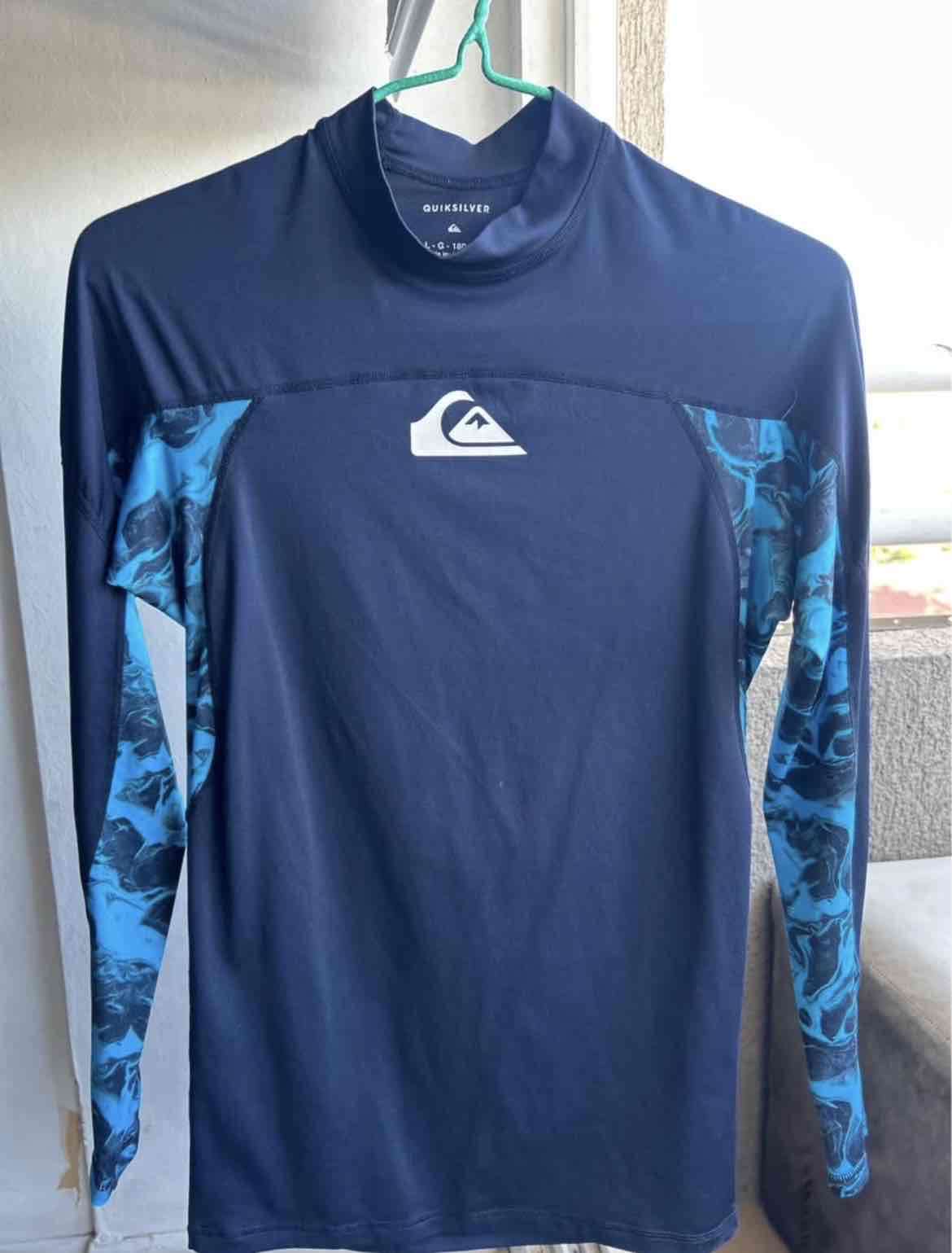 Polera Quiksilver manga larga azul