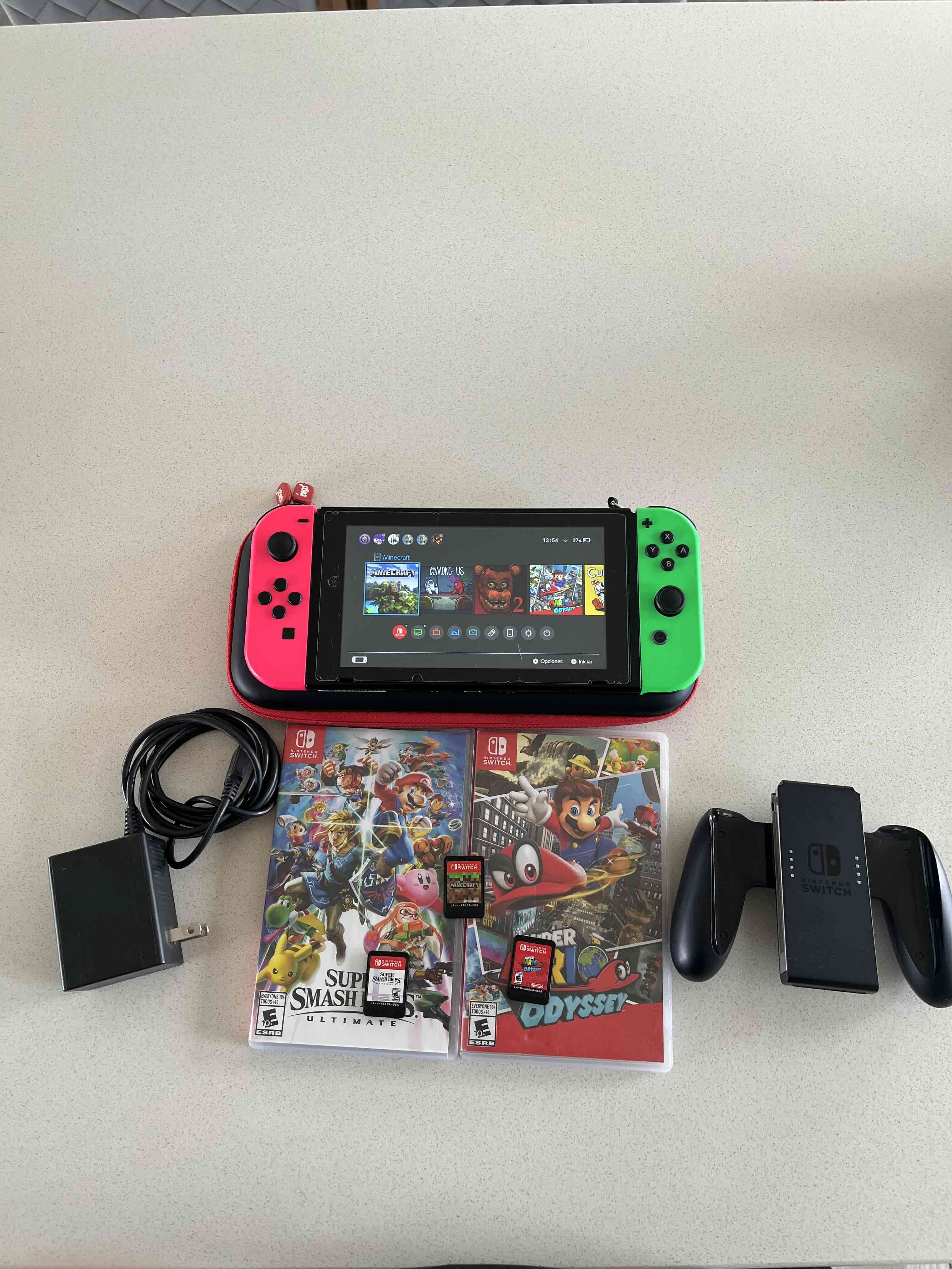 Nintendo Switch con juegos y accesorios - miniatura 2
