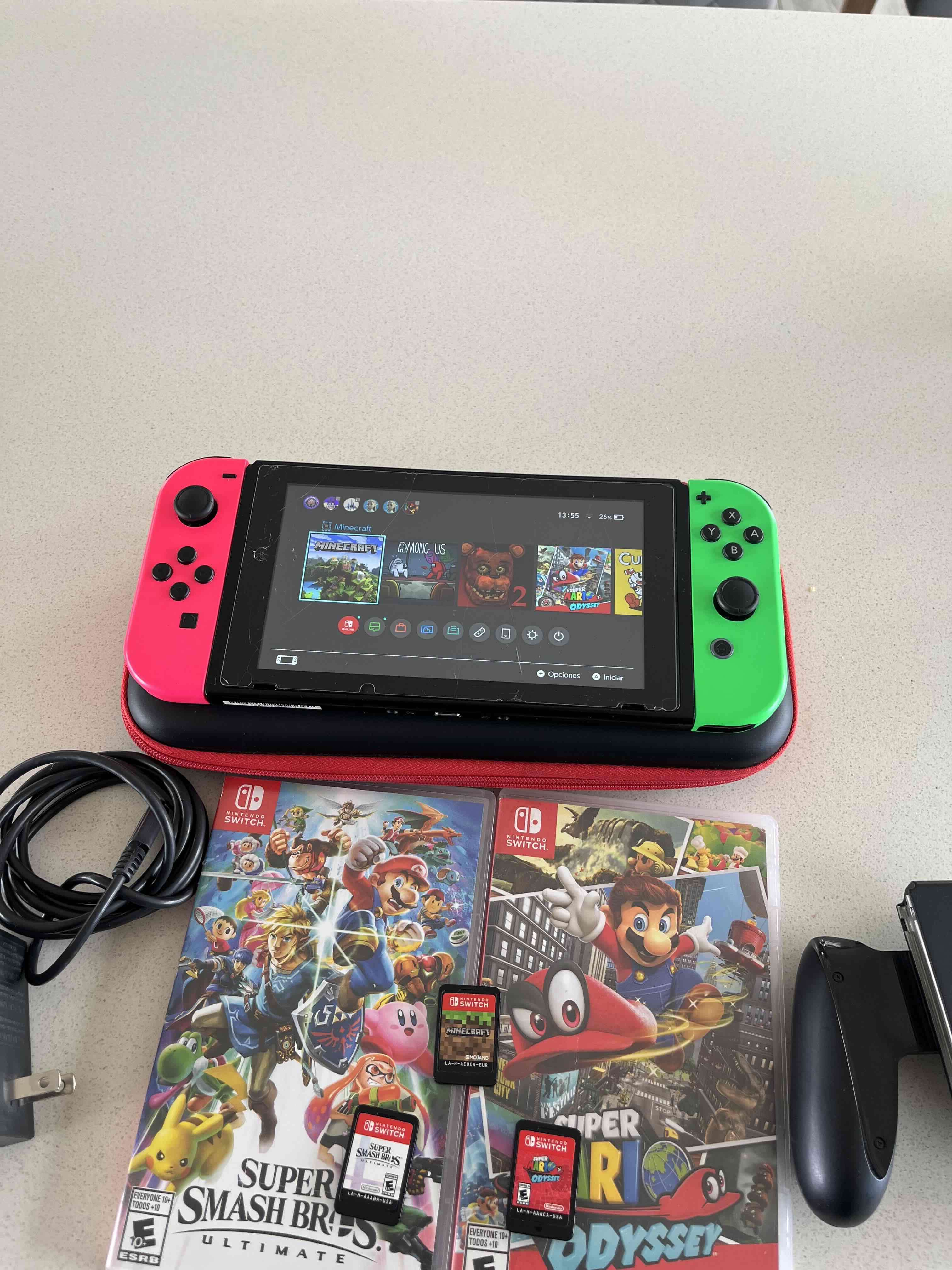 Nintendo Switch con juegos y accesorios - miniatura 3
