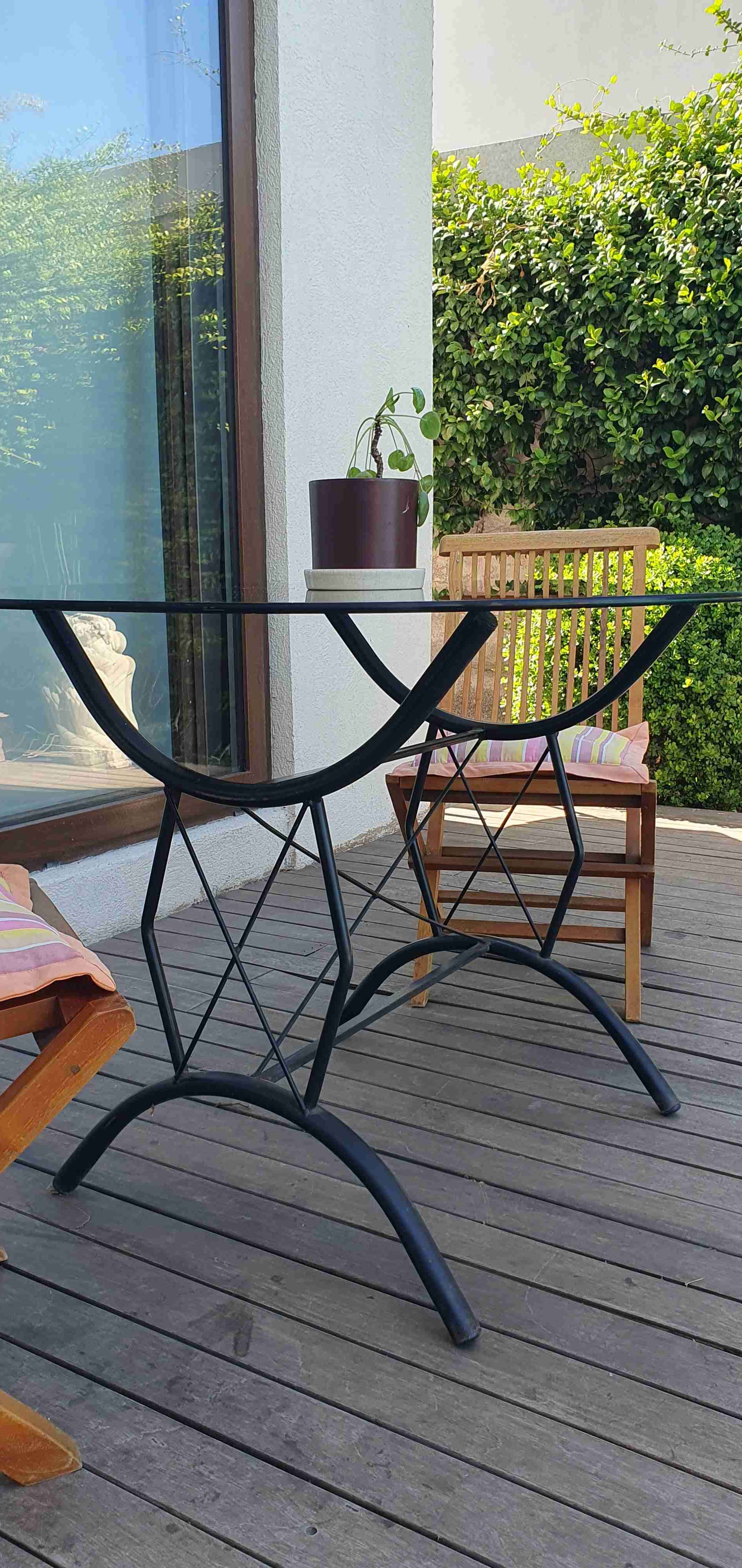 Mesa redonda de vidrio. - miniatura 2