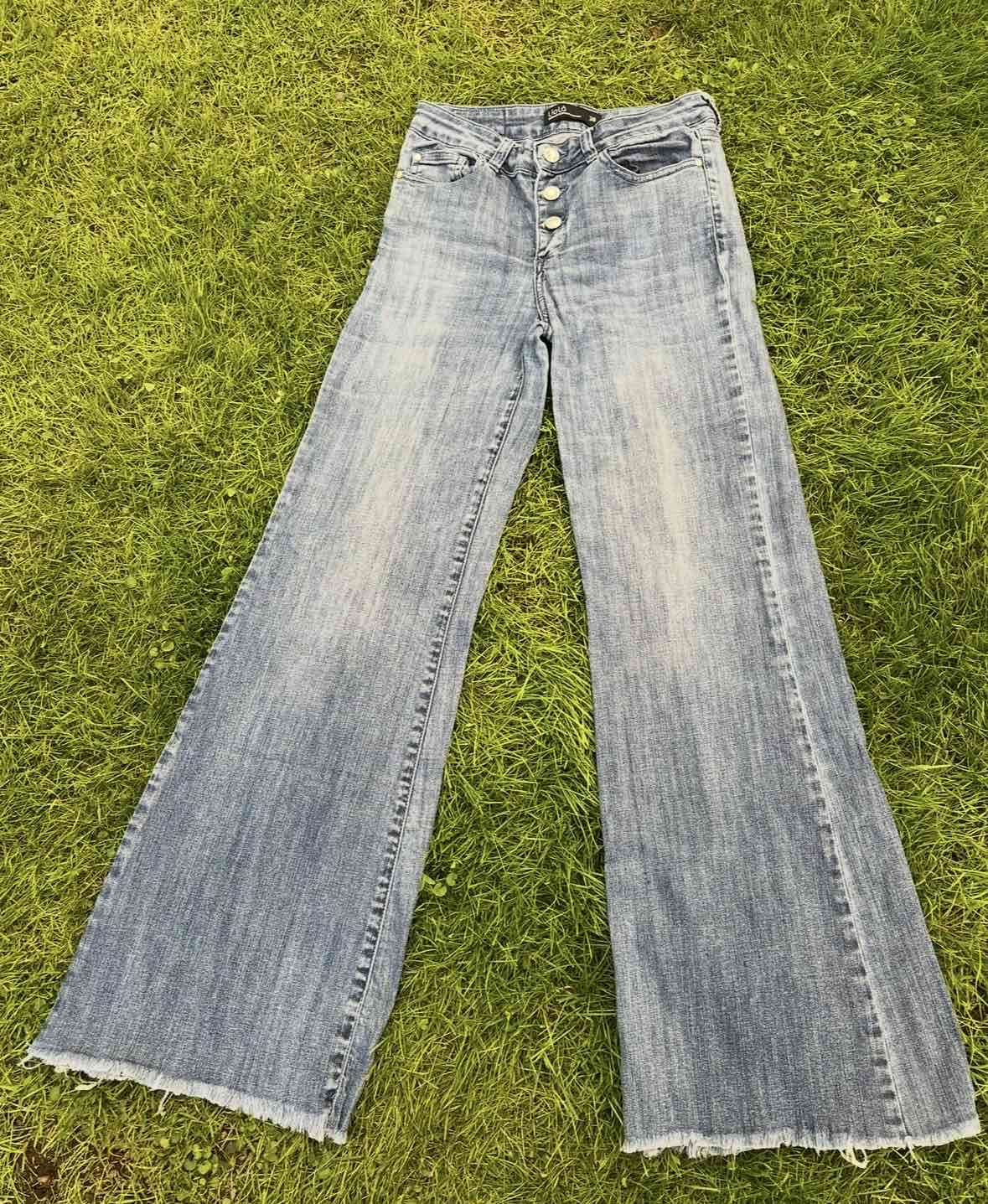 Jeans anchos de mezclilla clara