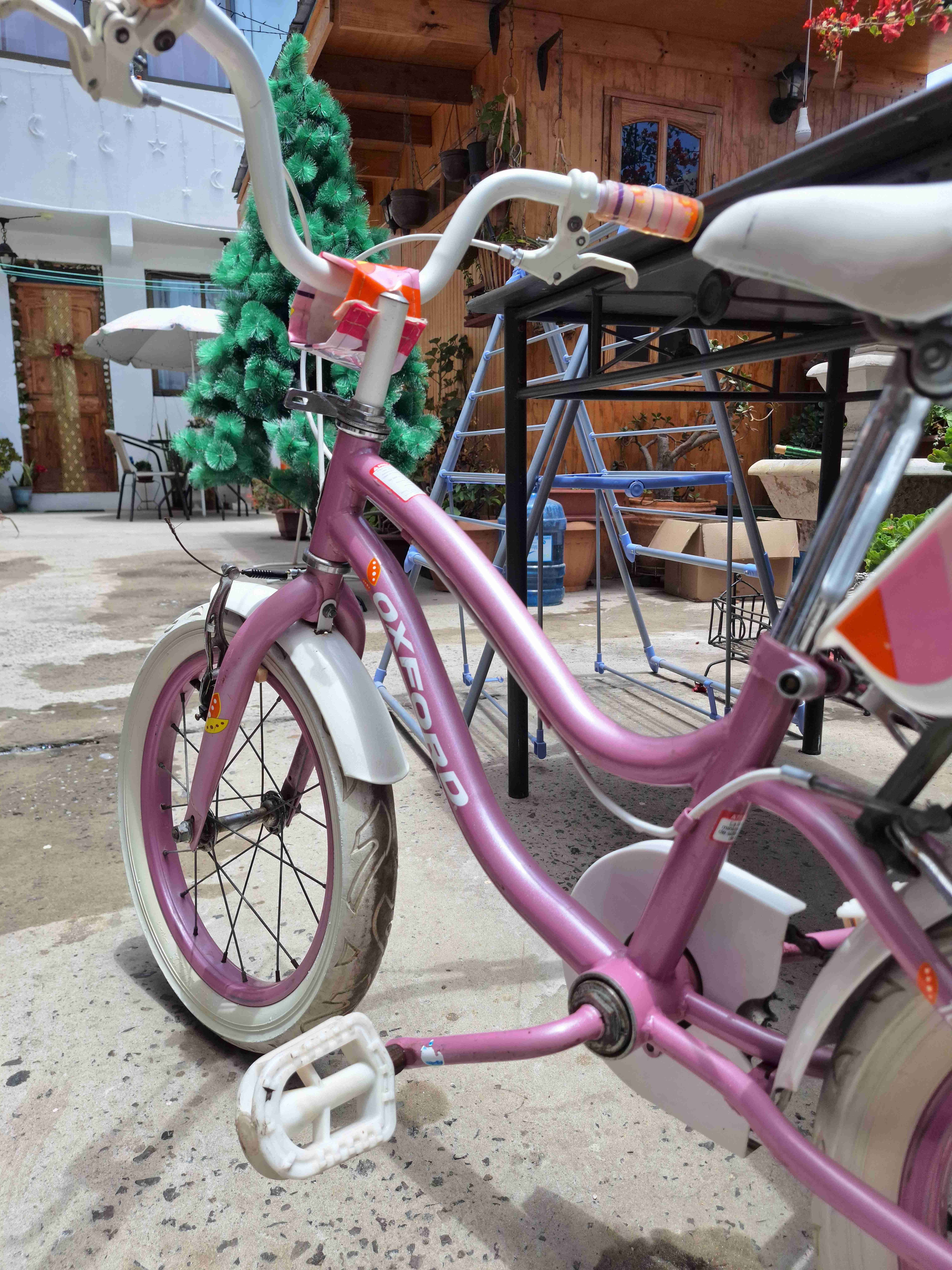 Bicicleta infantil rosada - miniatura 2