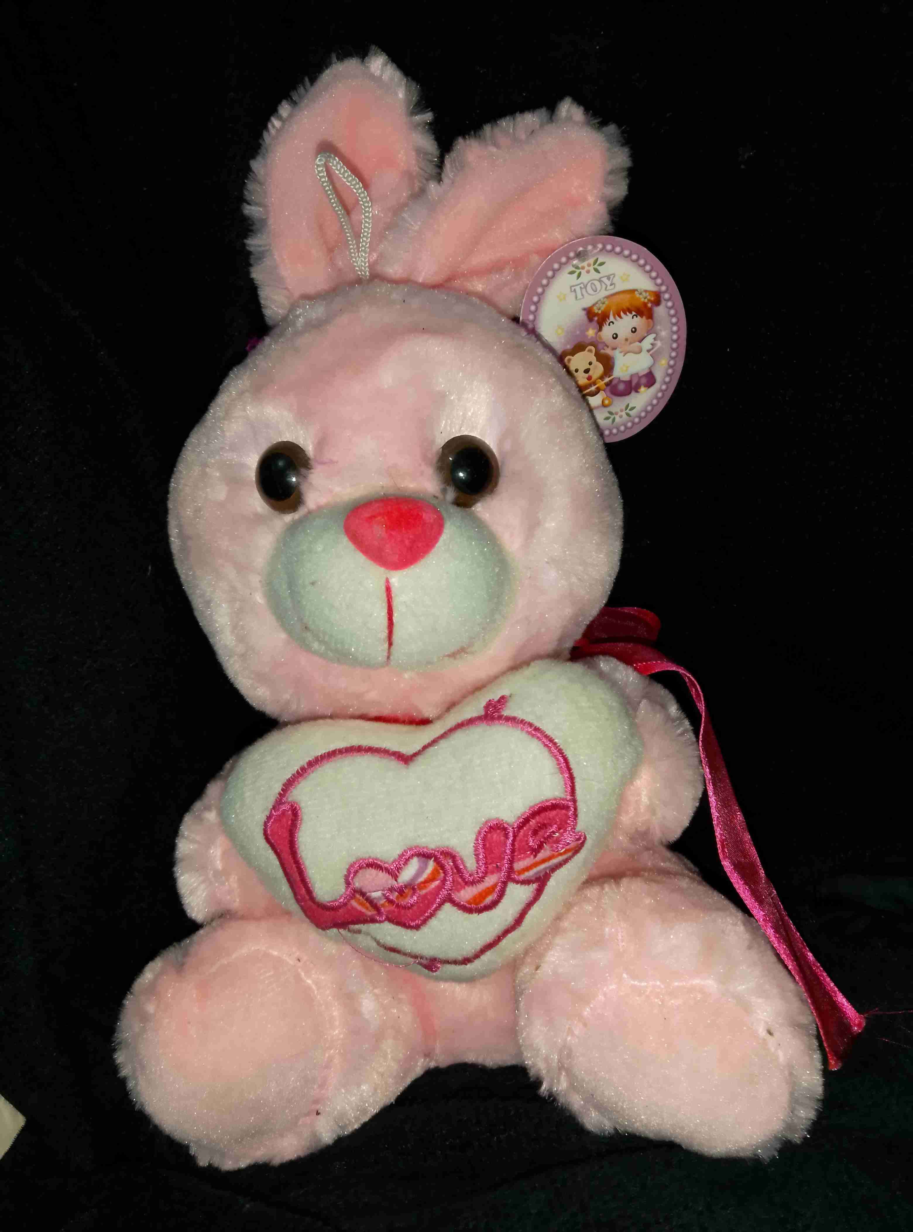 Peluche conejo rosa con corazón