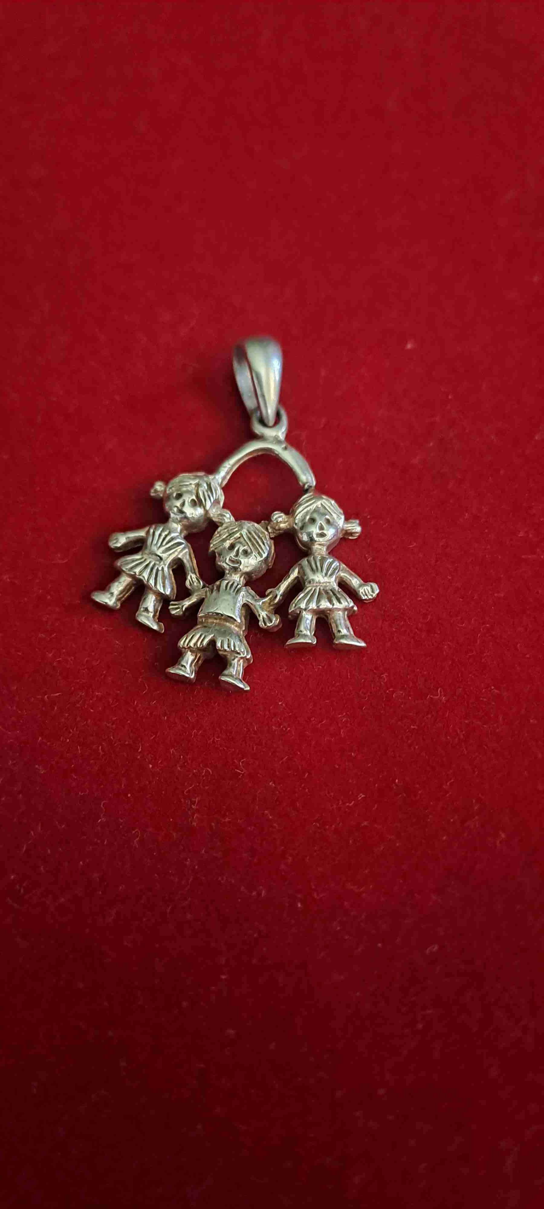 Dije de plata niños