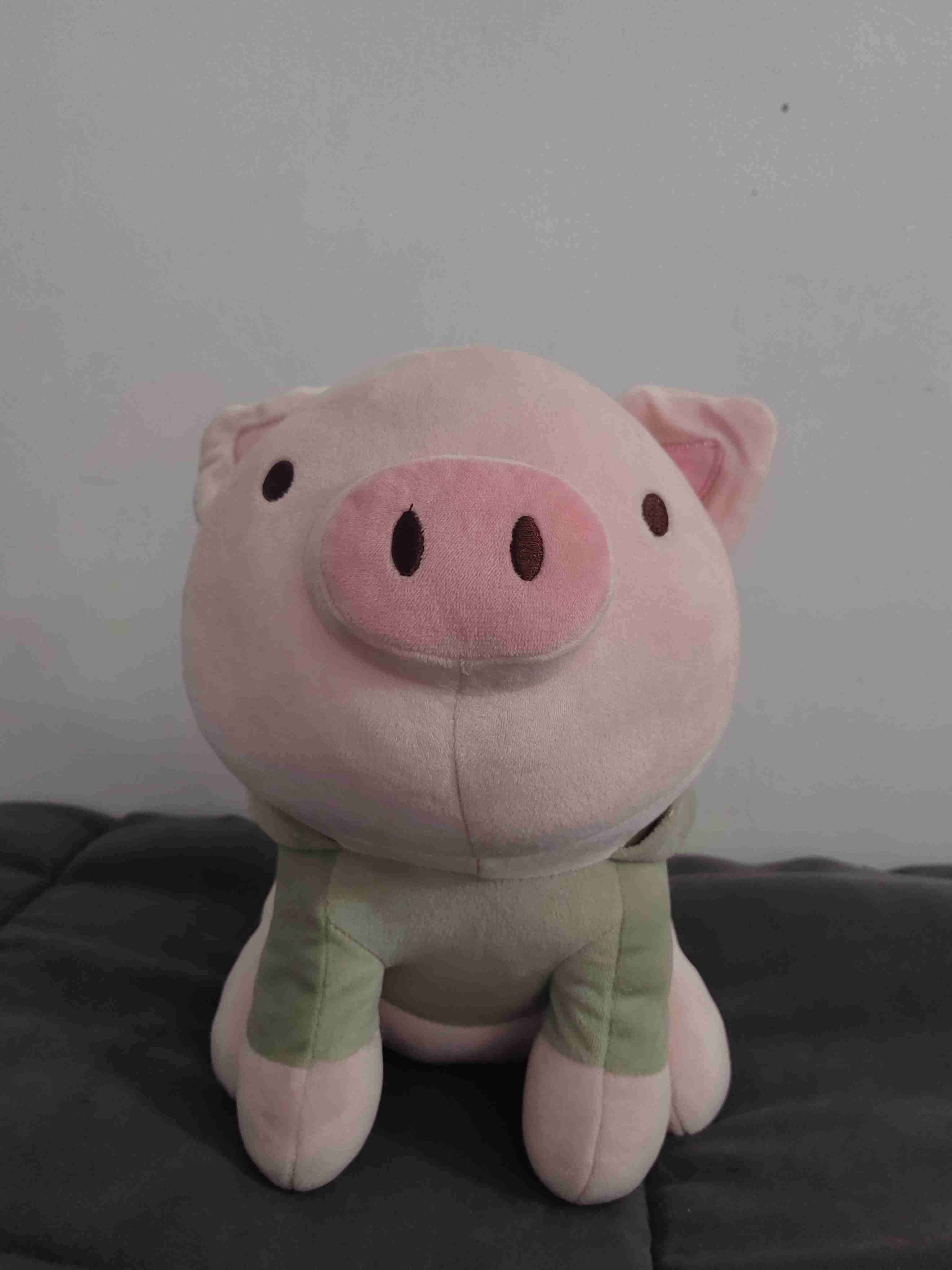 Peluche cerdito rosado con gorro de cocodrilo