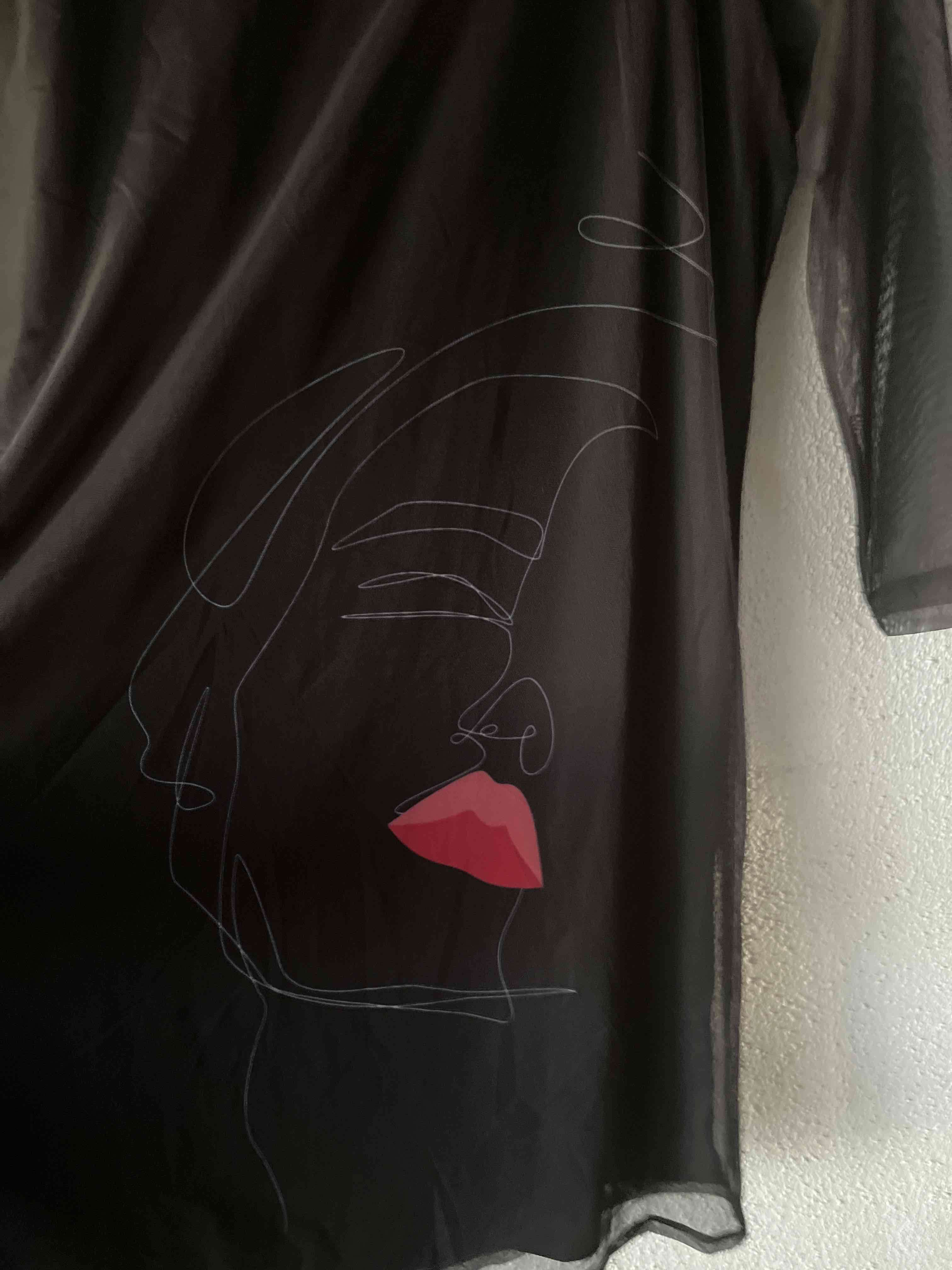 Vestido negro elegante - miniatura 2