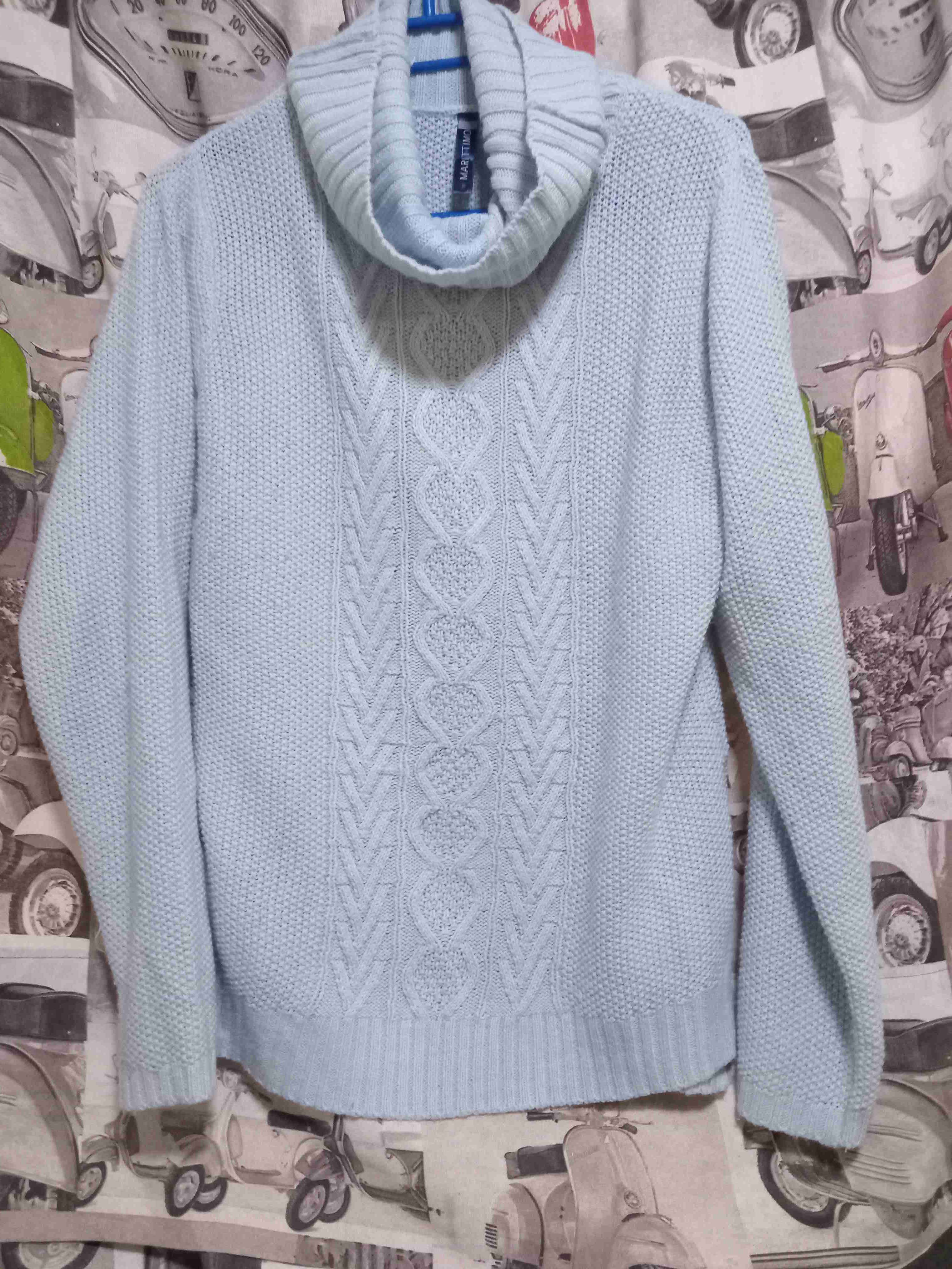 Suéter cuello alto celeste