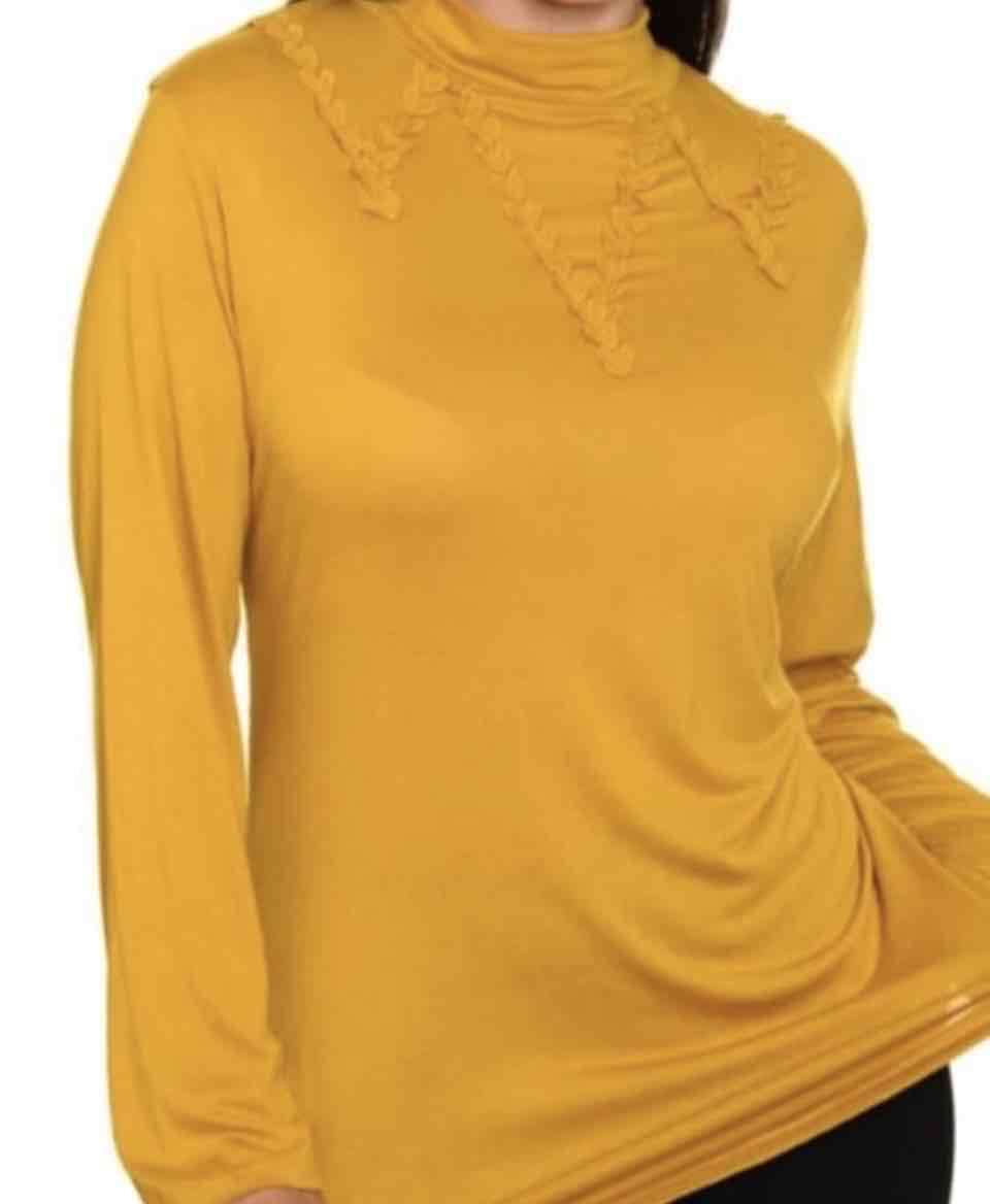 Poleras manga larga con diseño y cuello alto. - miniatura 3