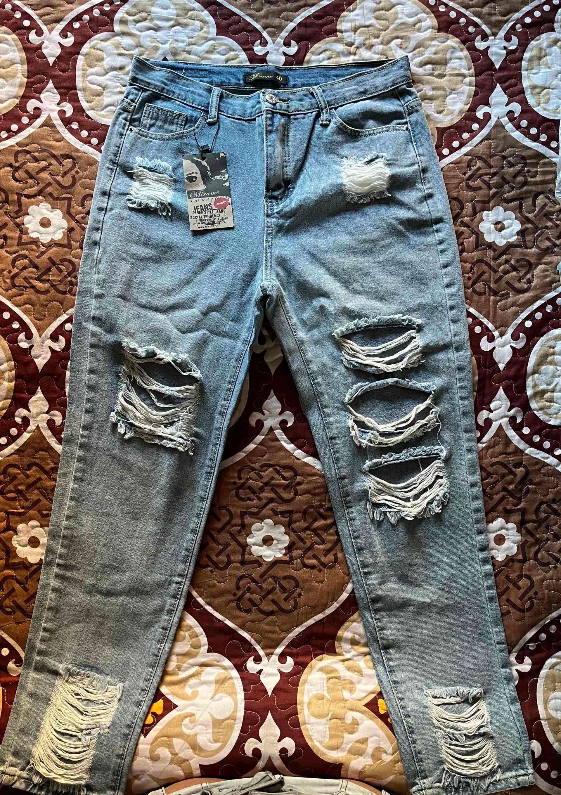 Jeans rasgados tiro alto