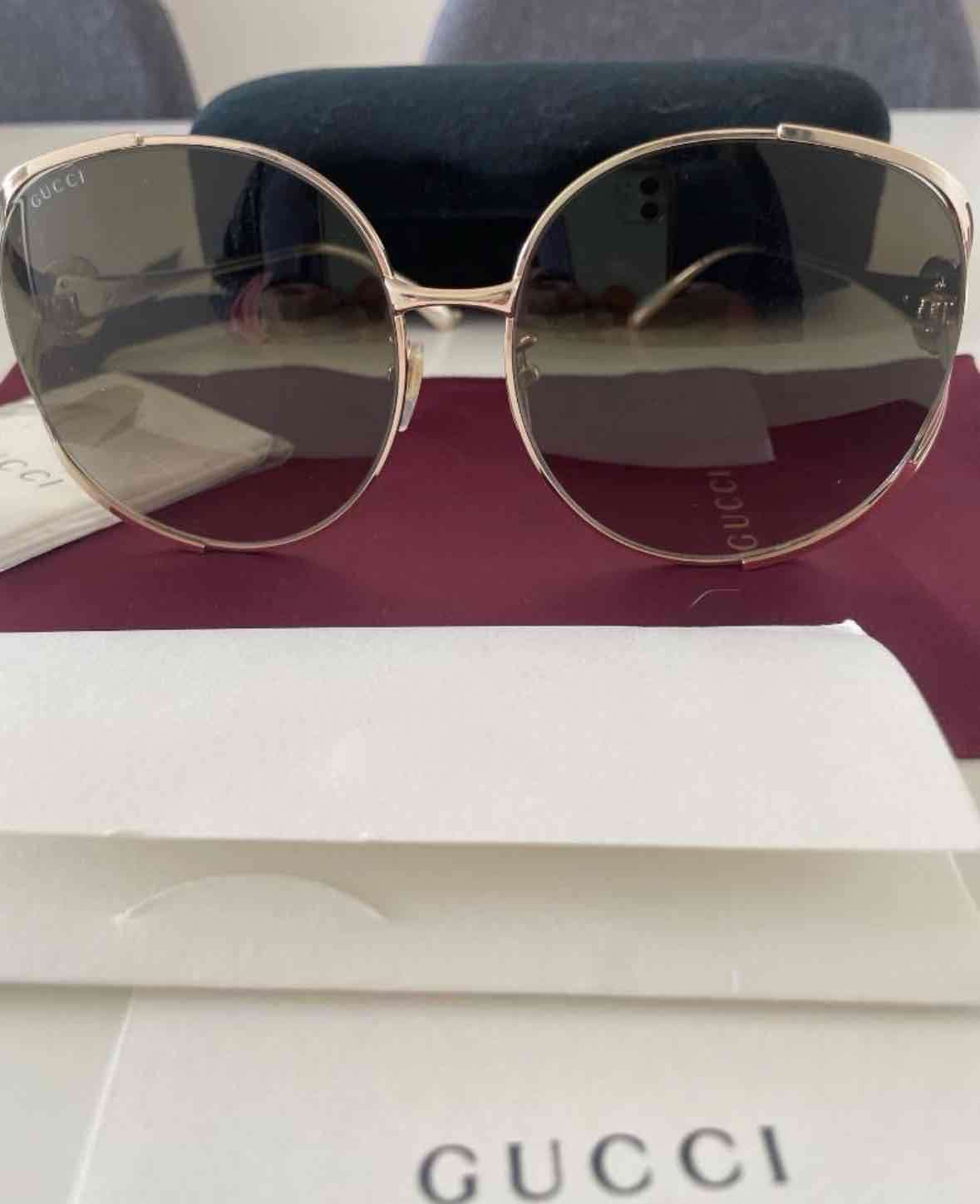 Gafas de sol Gucci doradas