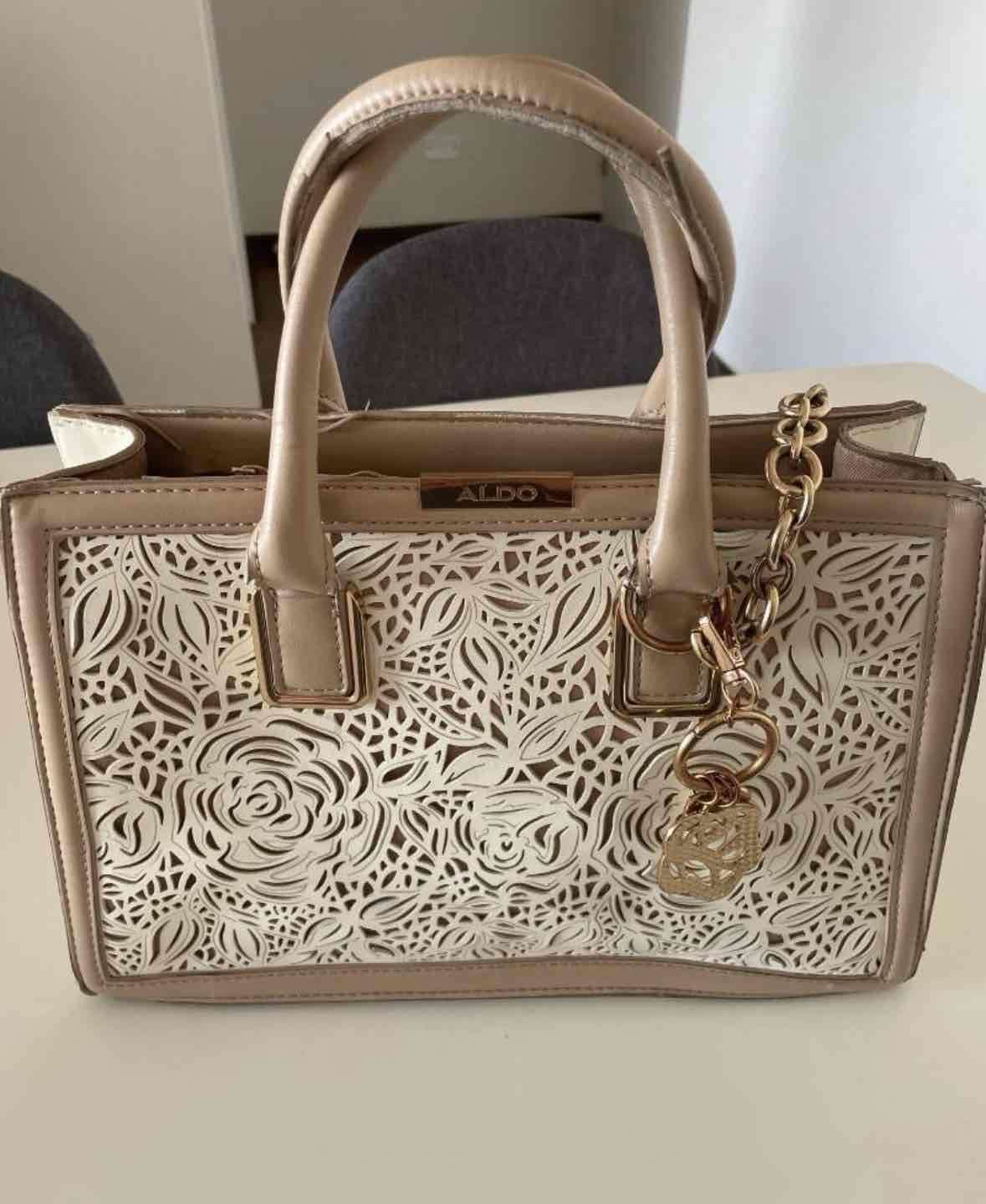 Cartera Aldo beige calada